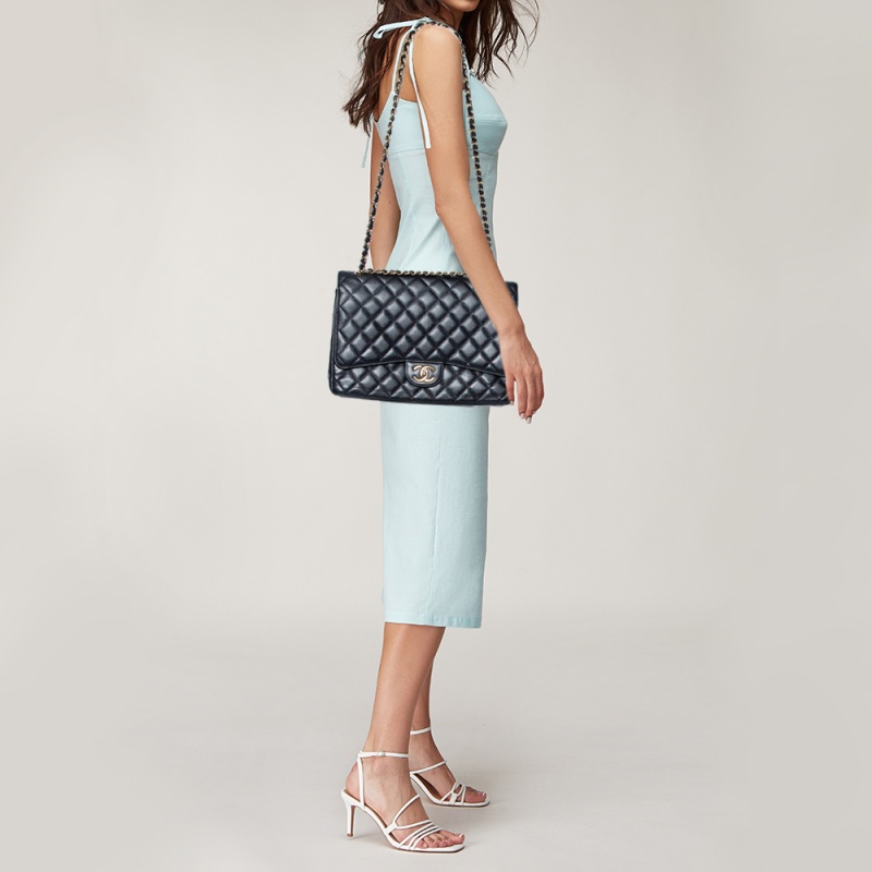 

Chanel Black Quilted Caviar Leather Maxi Classic Double Flap Bag