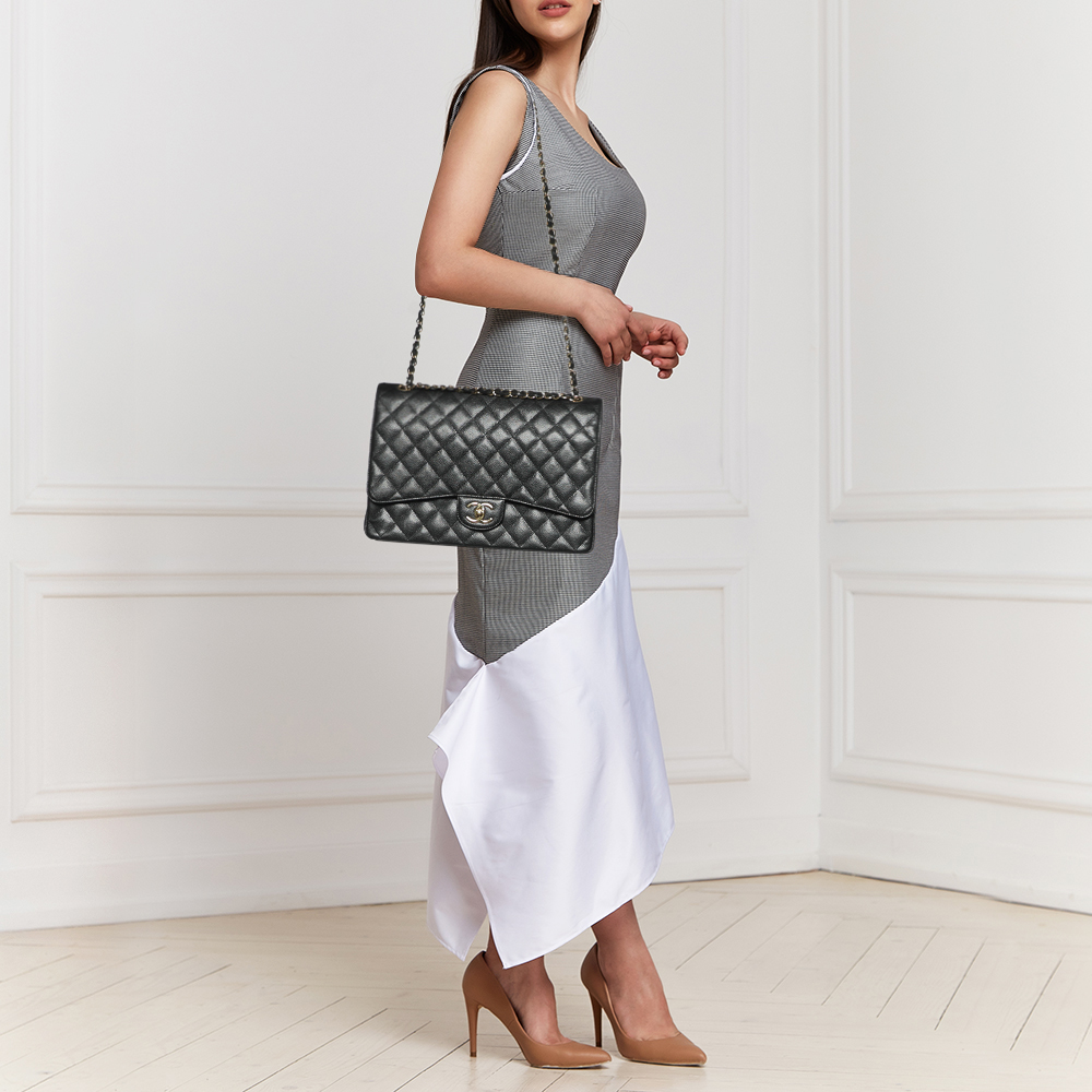 

Chanel Black Quilted Caviar Leather Maxi Classic Double Flap Bag