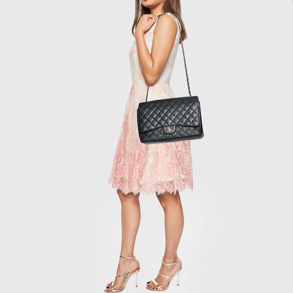 

Chanel Black Quilted Caviar Leather Maxi Classic Double Flap Bag