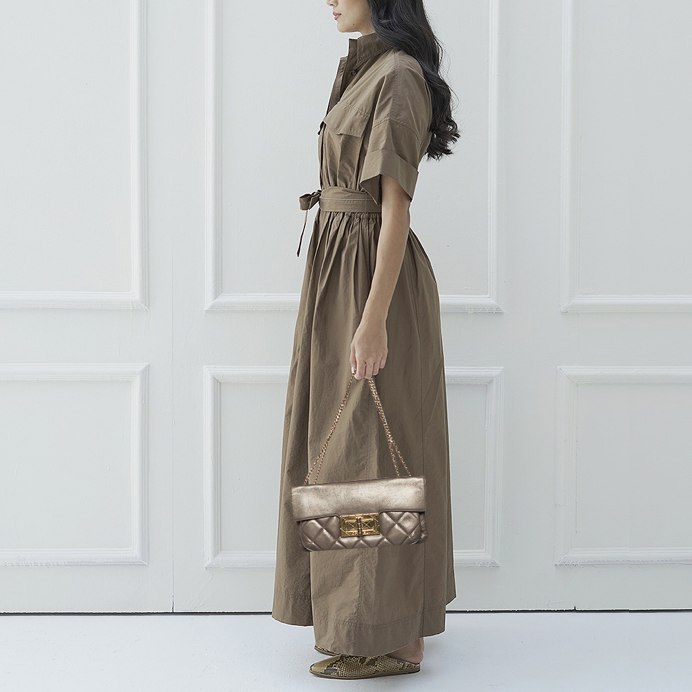 

Chanel Brown Quilted Leather Turn Lock Flap Bag