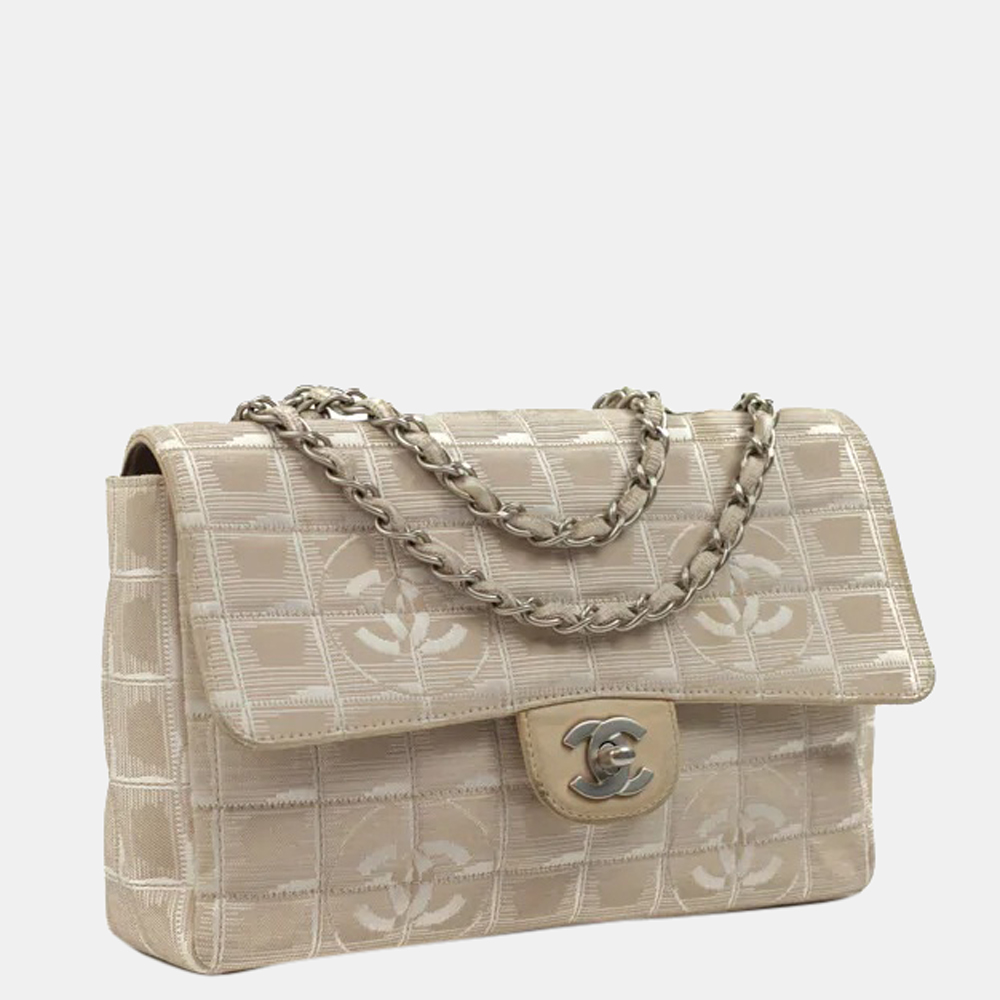 

Chanel Beige canvas Vintage Flap bag