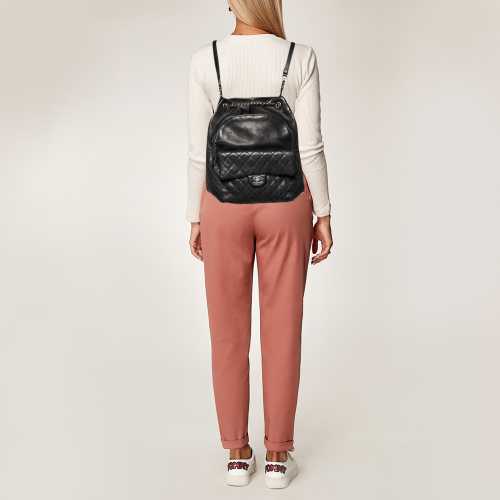 

Chanel Black Quilted Leather Small Drawstring CC Flap Backpack