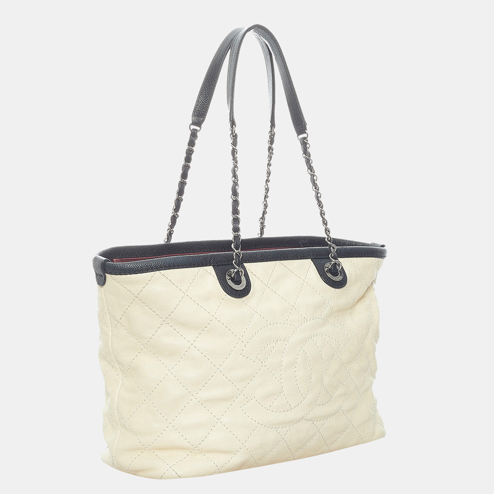 

Chanel Black/White Caviar Shopping Tote Bag