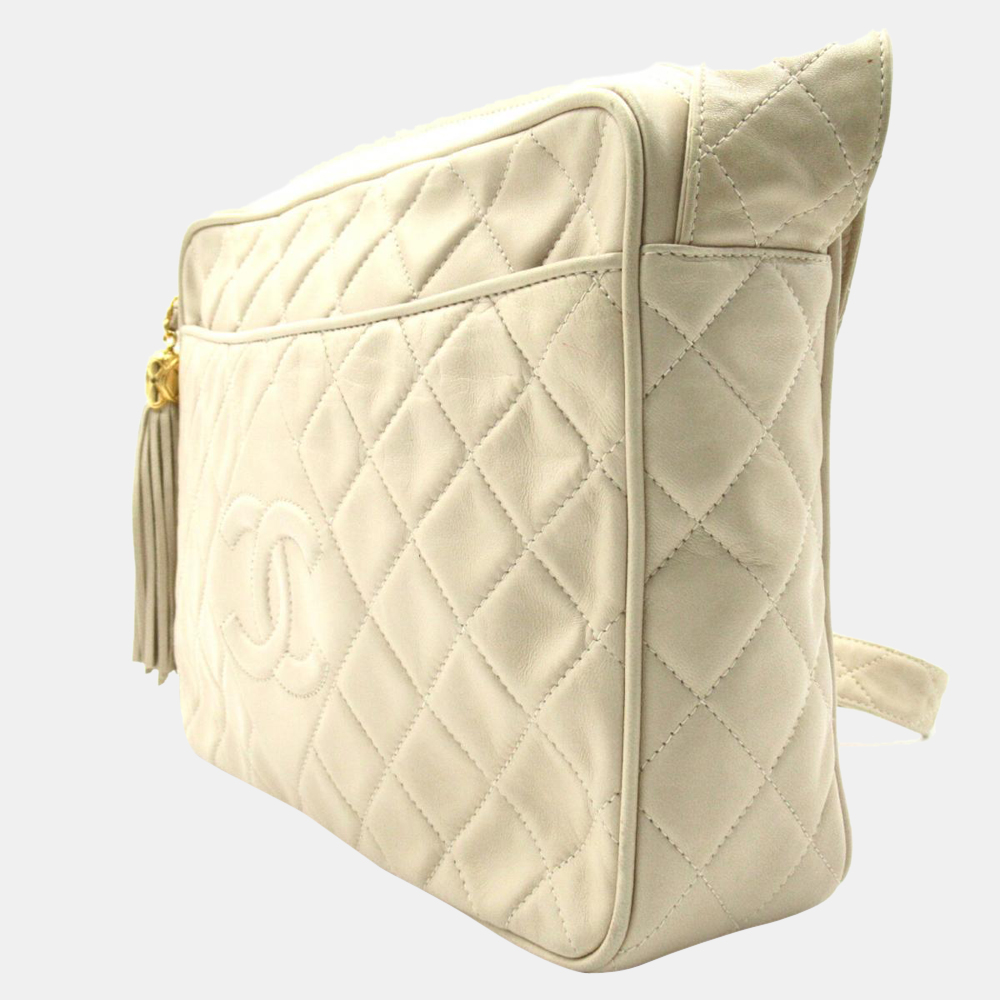 

Chanel White CC Quilted Leather Tassle Crossbody Bag