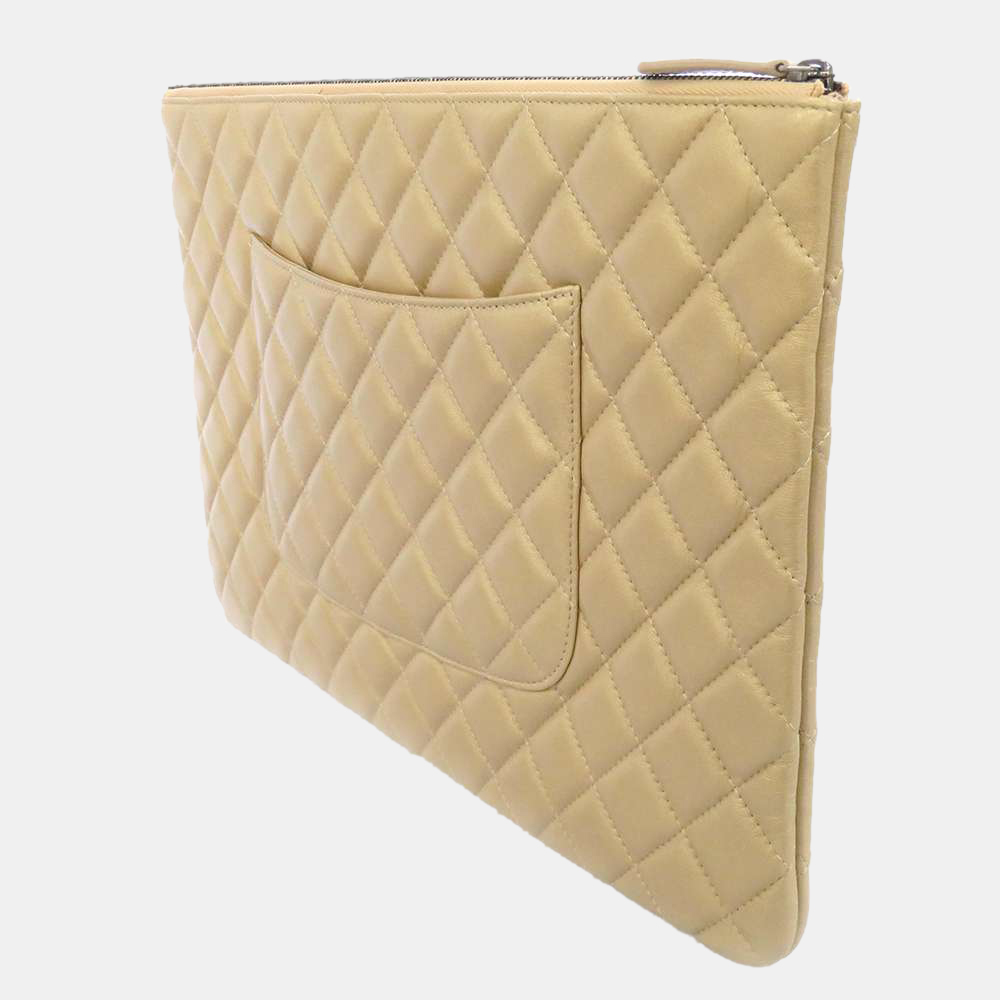 

Chanel Gold Leather Quilted O Clutch Bag