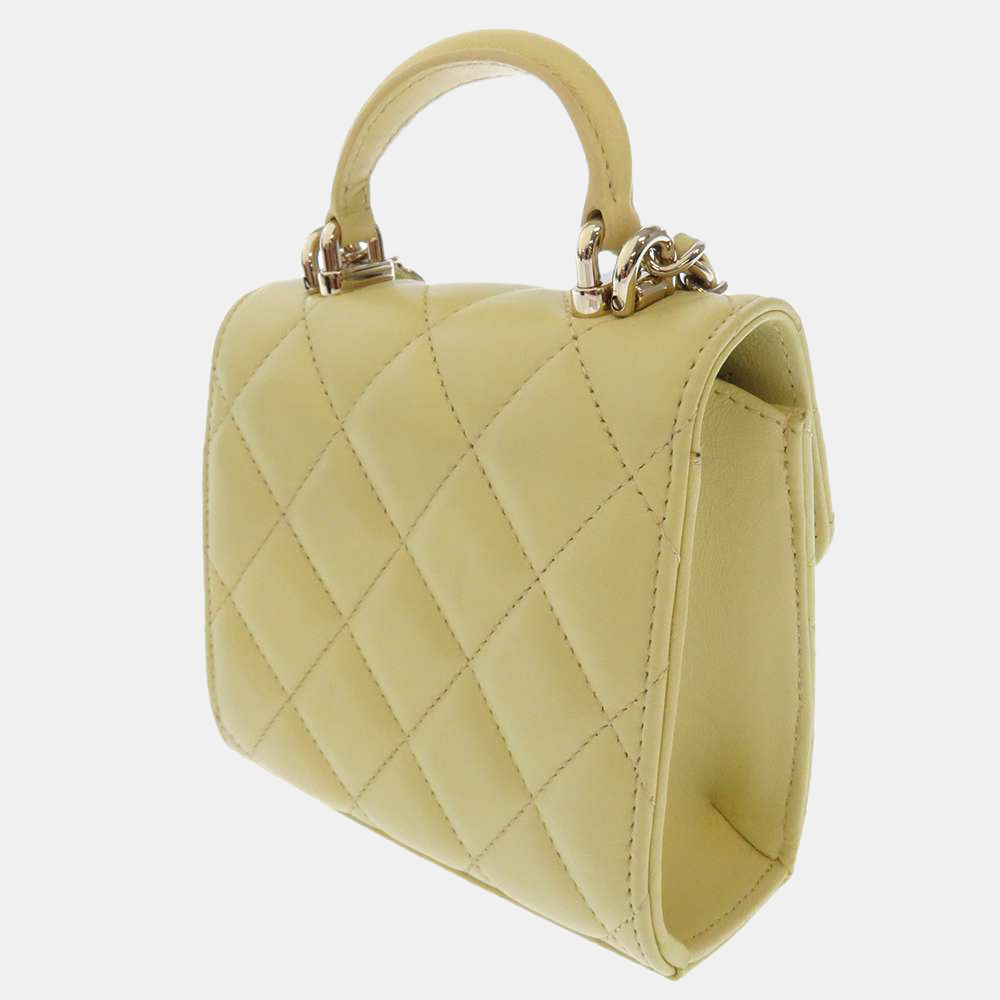 

Chanel Yellow Lambskin Leather Mini Hop handle Flap Bag