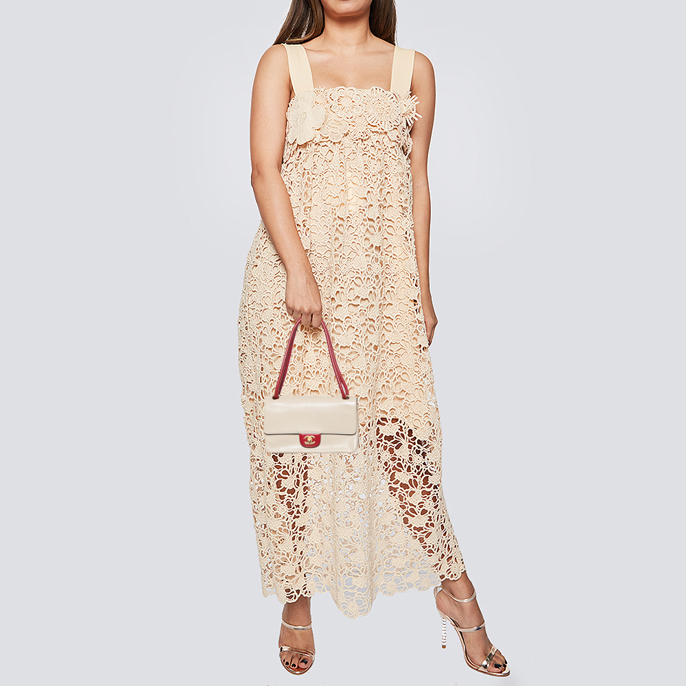 

Chanel Beige Perforated Leather Vintage Flap Bag