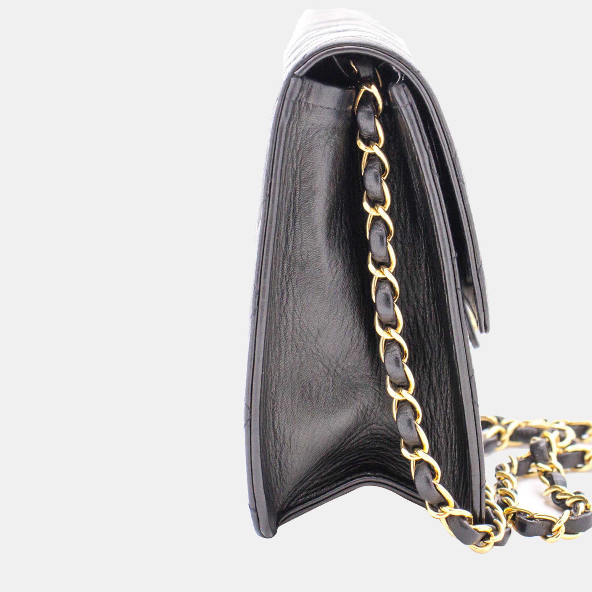 

Chanel Black Leather Vintage Flap Bag
