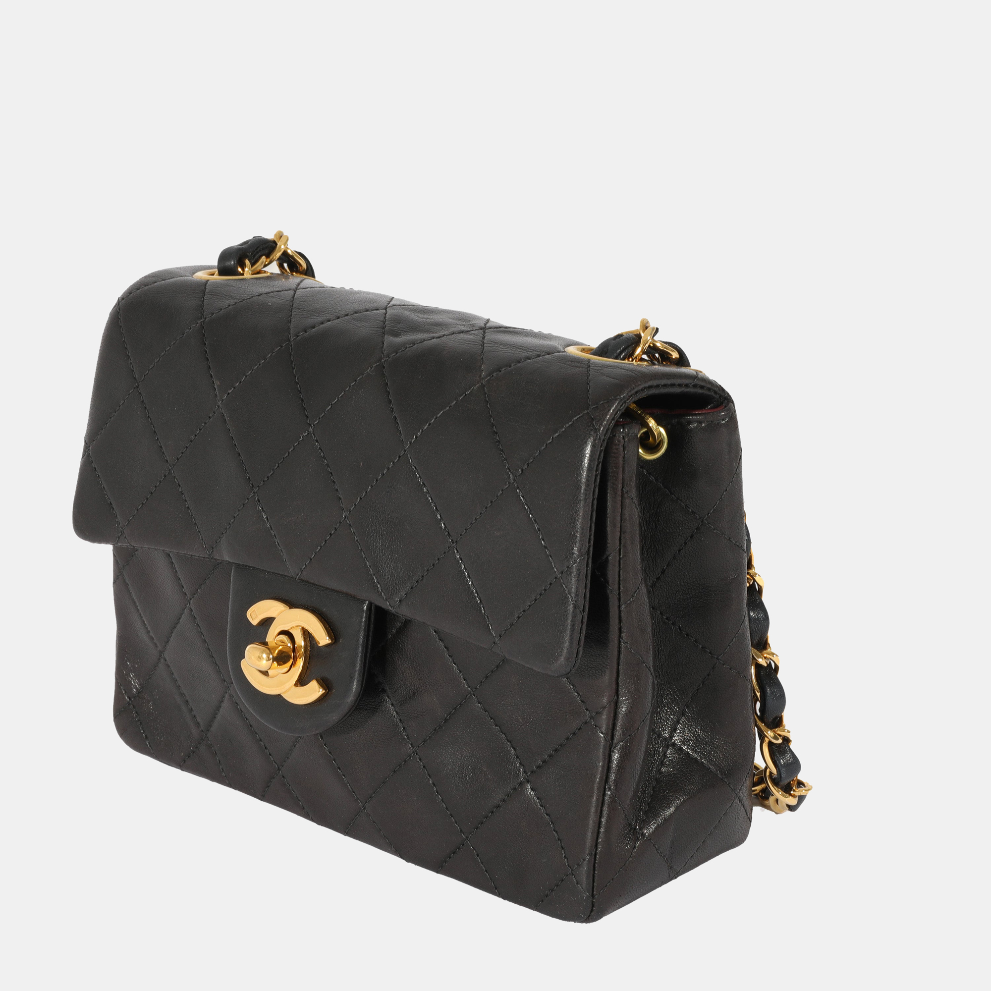 

Chanel Vintage Black Lambskin Leather Mini Flap Bag
