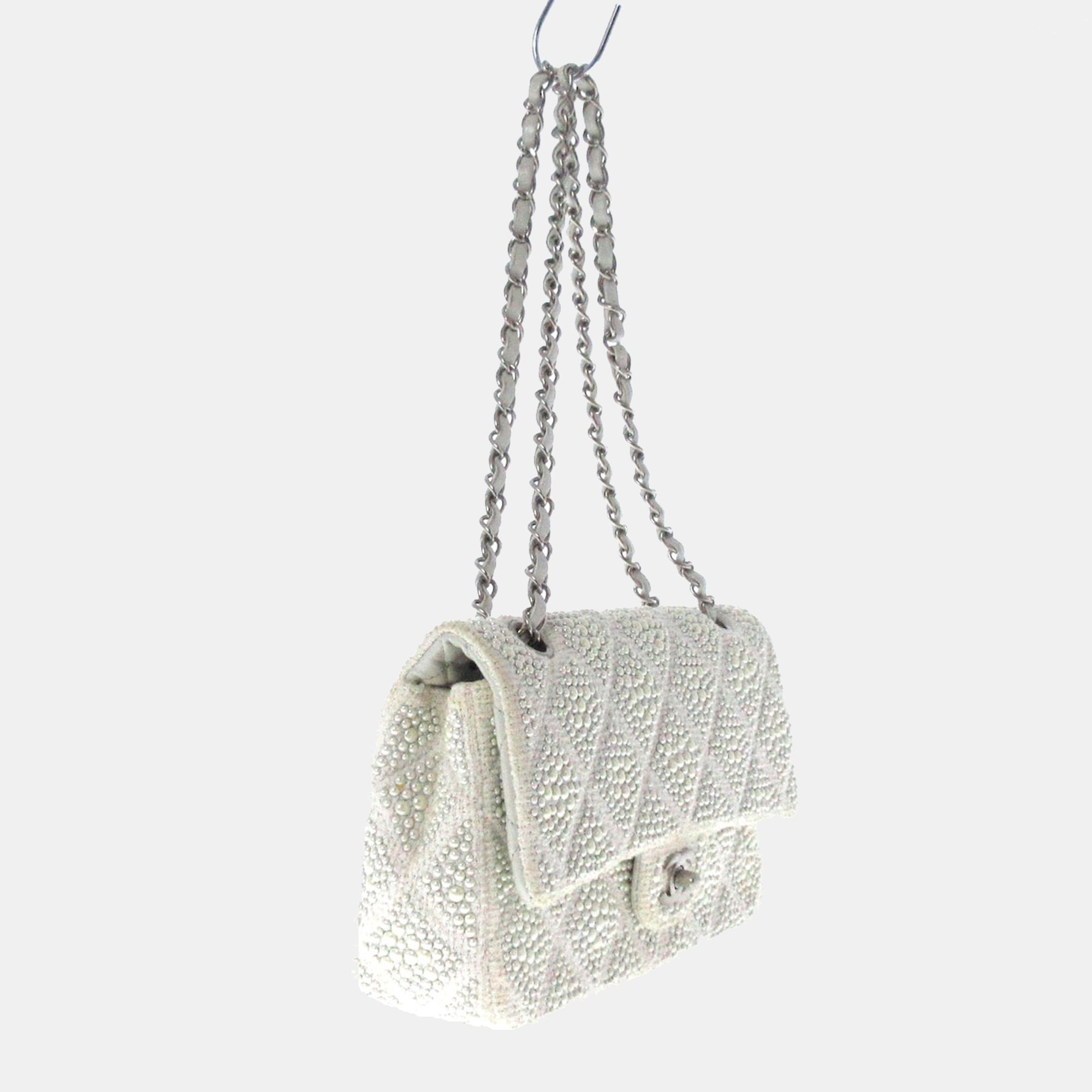 

Chanel White Canvas Crystal Flap Bag