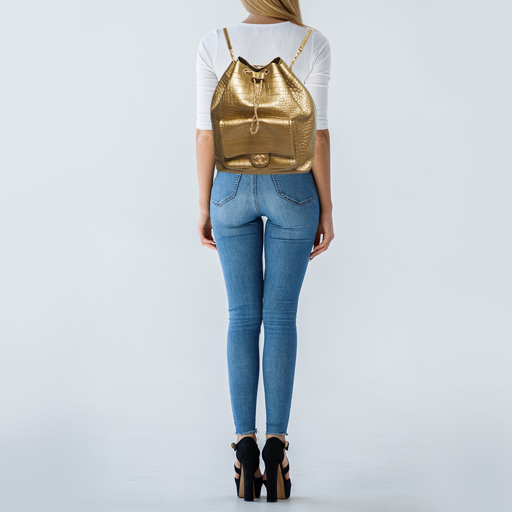 

Chanel Gold Croc Embossed Leather Drawstring Backpack