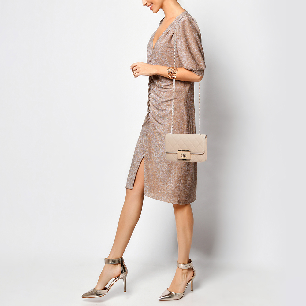 

Chanel Beige Quilted Leather Mini Beauty Lock Flap Bag