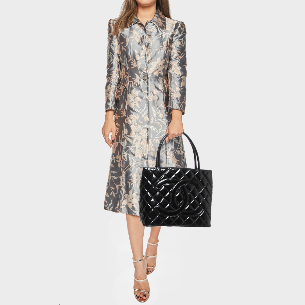 

Chanel Black Patent Leather Medallion Tote Bag