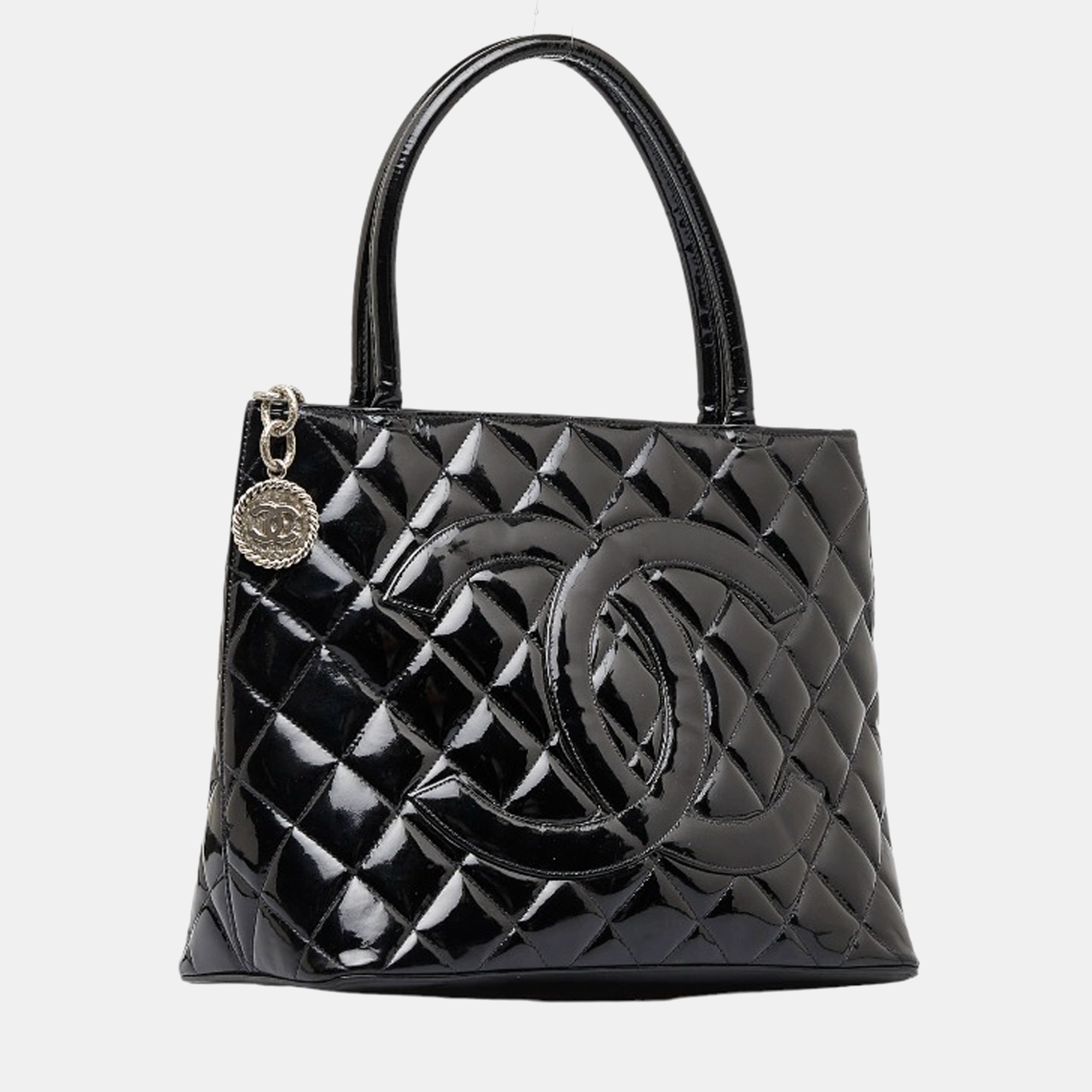 

Chanel Black CC Patent Leather Medallion Tote Tote Bag