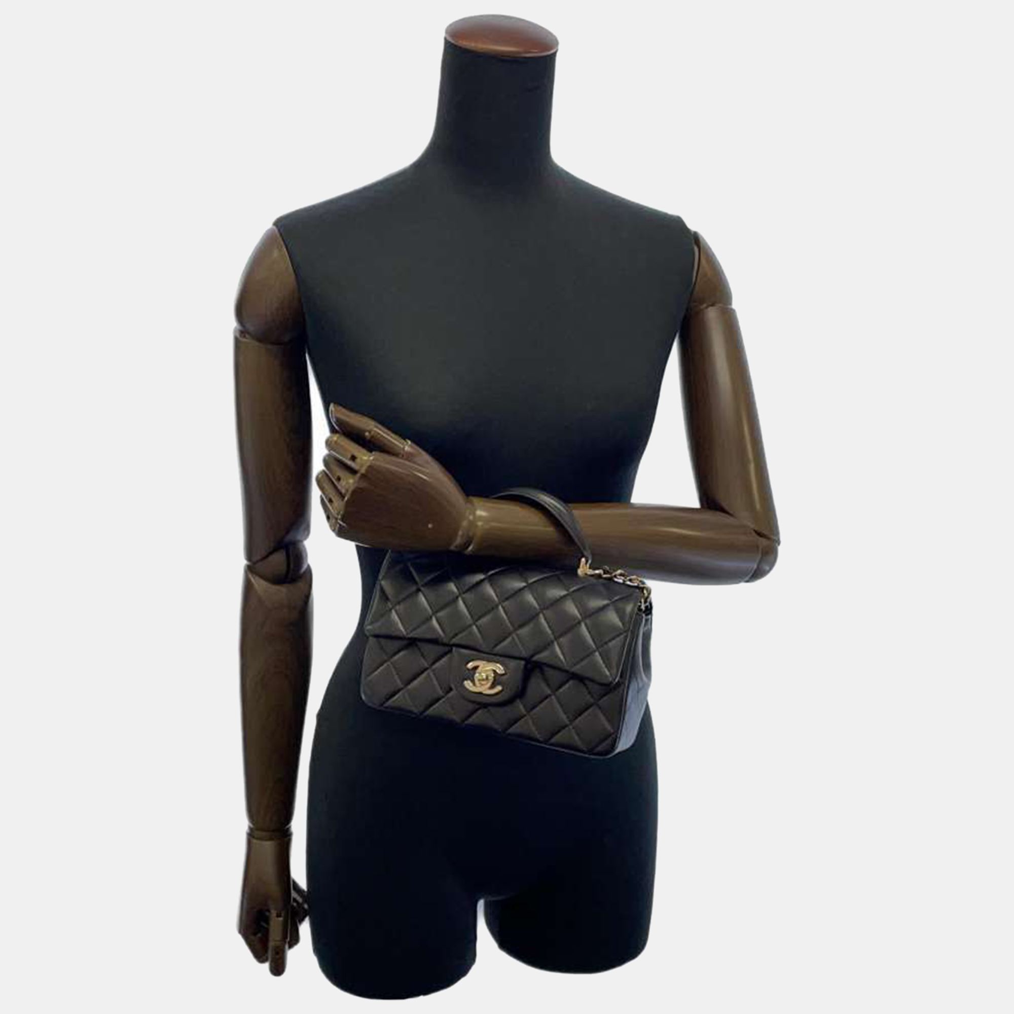 

Chanel Black Leather Mini Top Handle Flap Bag