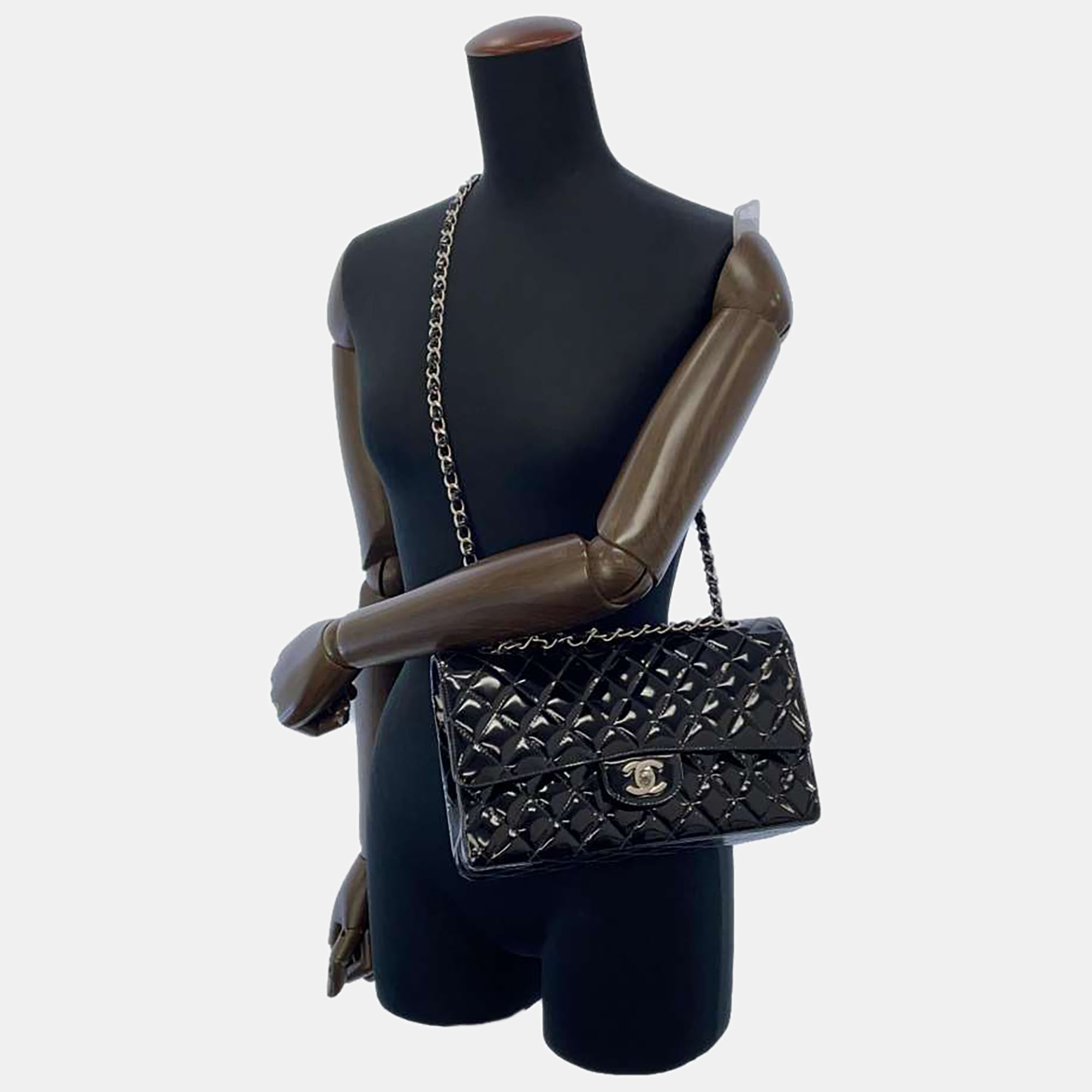 

Chanel Black Patent Leather Double Flap Bag