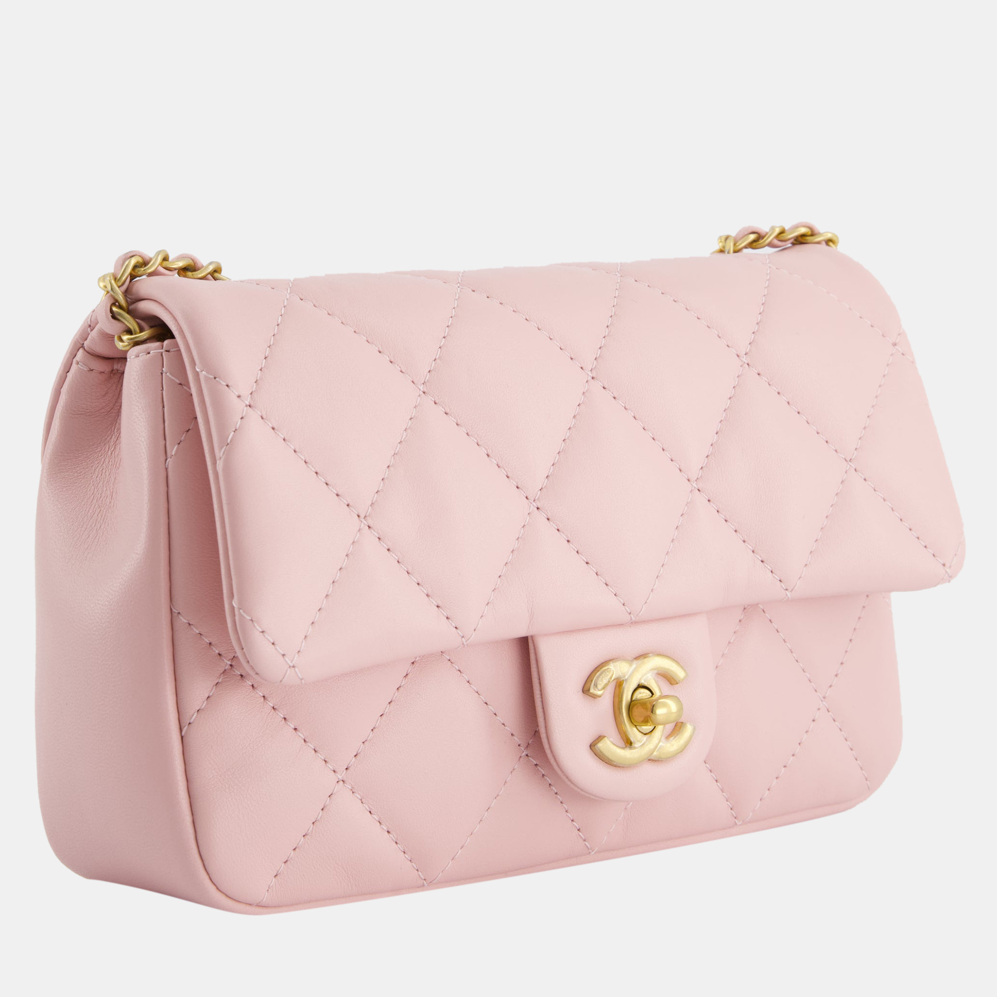 

Chanel Pink 22B Mini Flap Bag in Lambskin Leather with Gold Hardware and Hearts Chain Detail