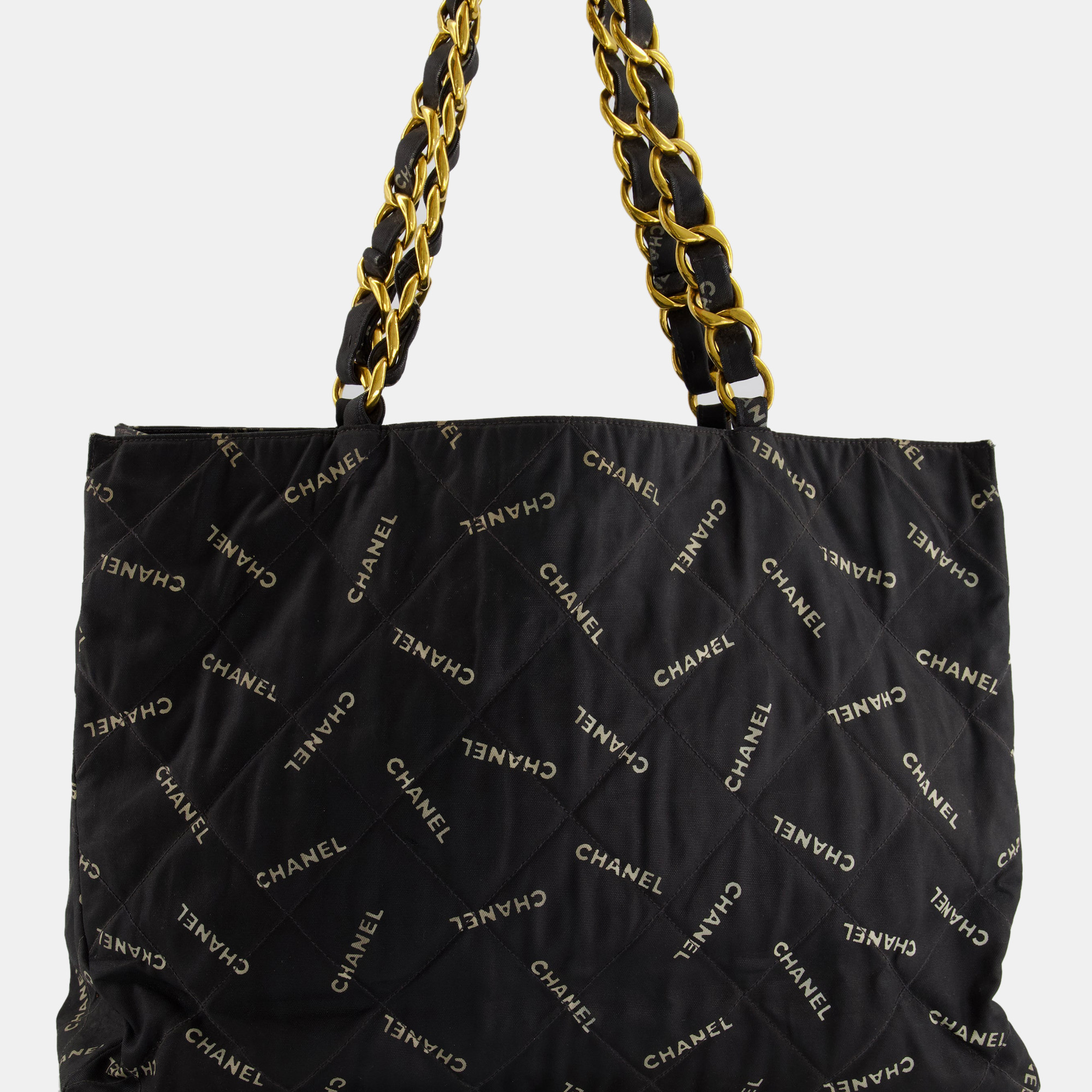 Chanel Vintage Black Bag in Quilted Canvas Logo Print with Gold Hardware  Chanel