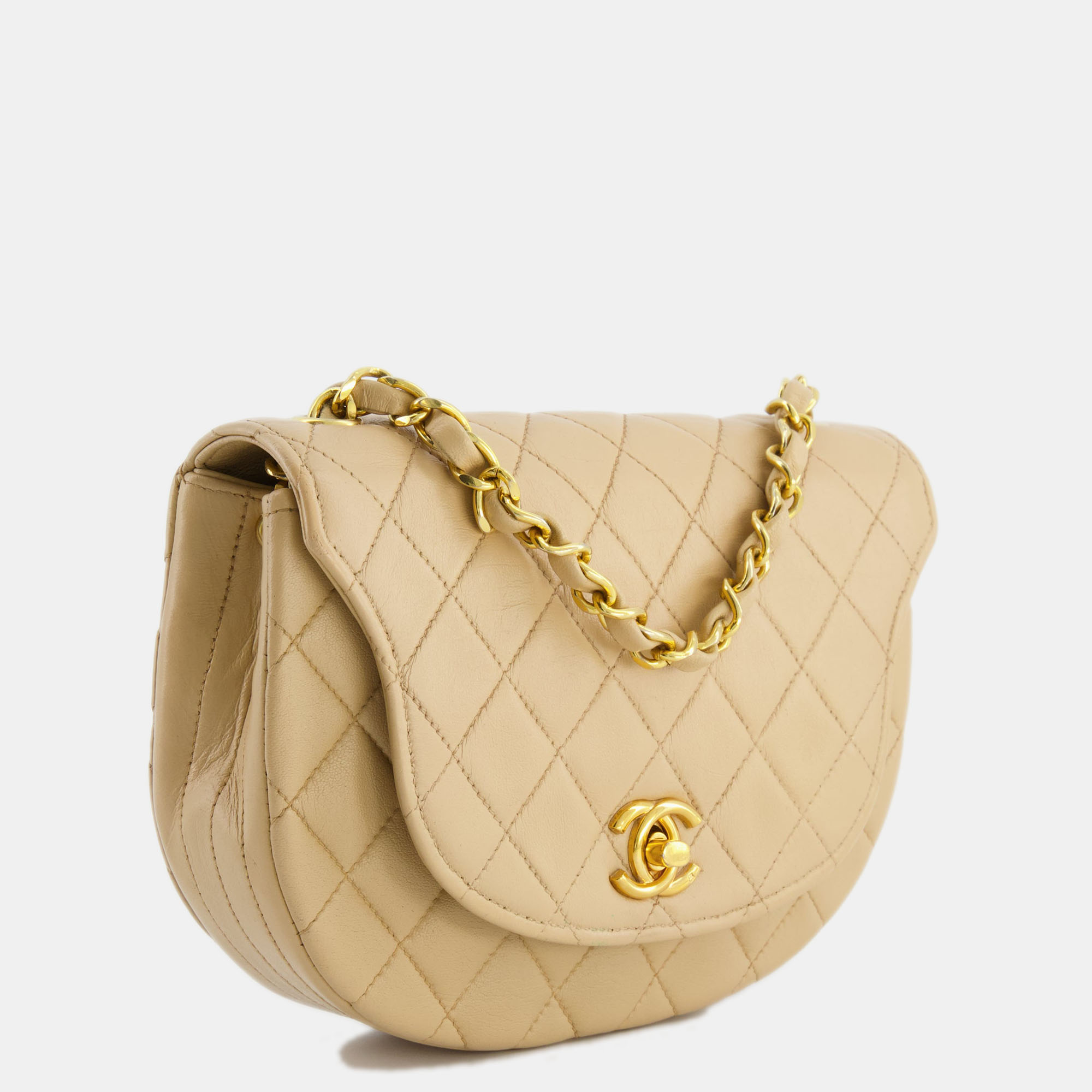 

Chanel Vintage Beige Mini Half Moon Bag with 24k Gold Hardware