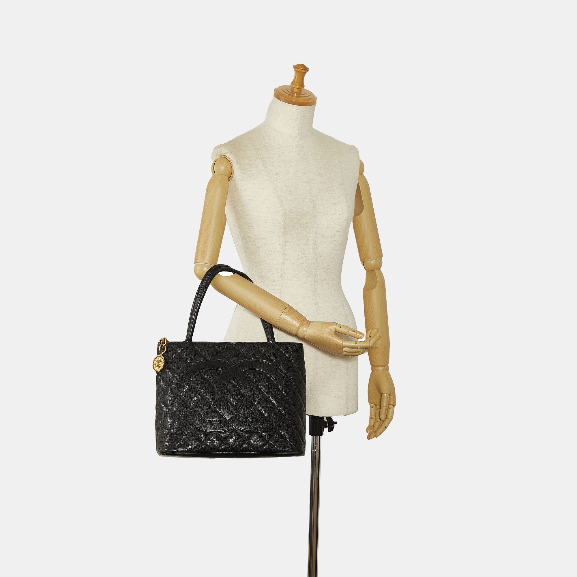 

Chanel Black Caviar Medallion Tote Bag