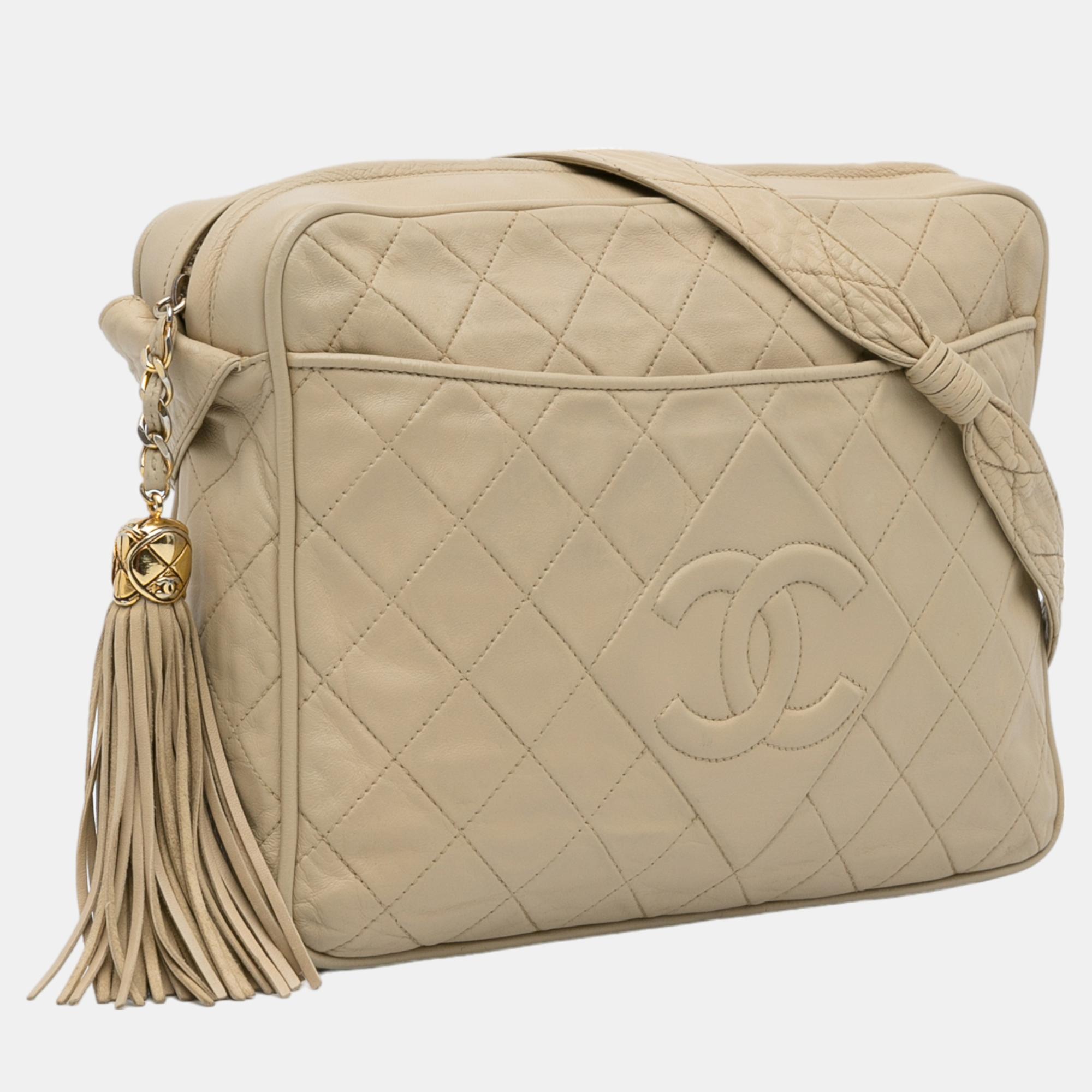

Chanel Beige Vintage CC Tassel Camera Bag