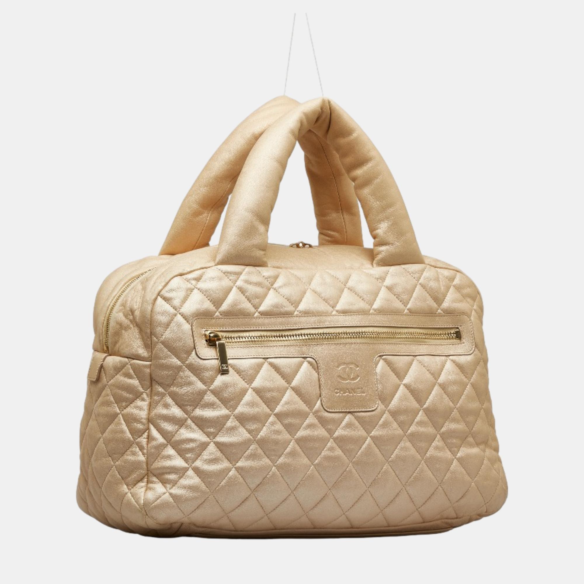 

Chanel Gold Leather CC Cocoon Handbag