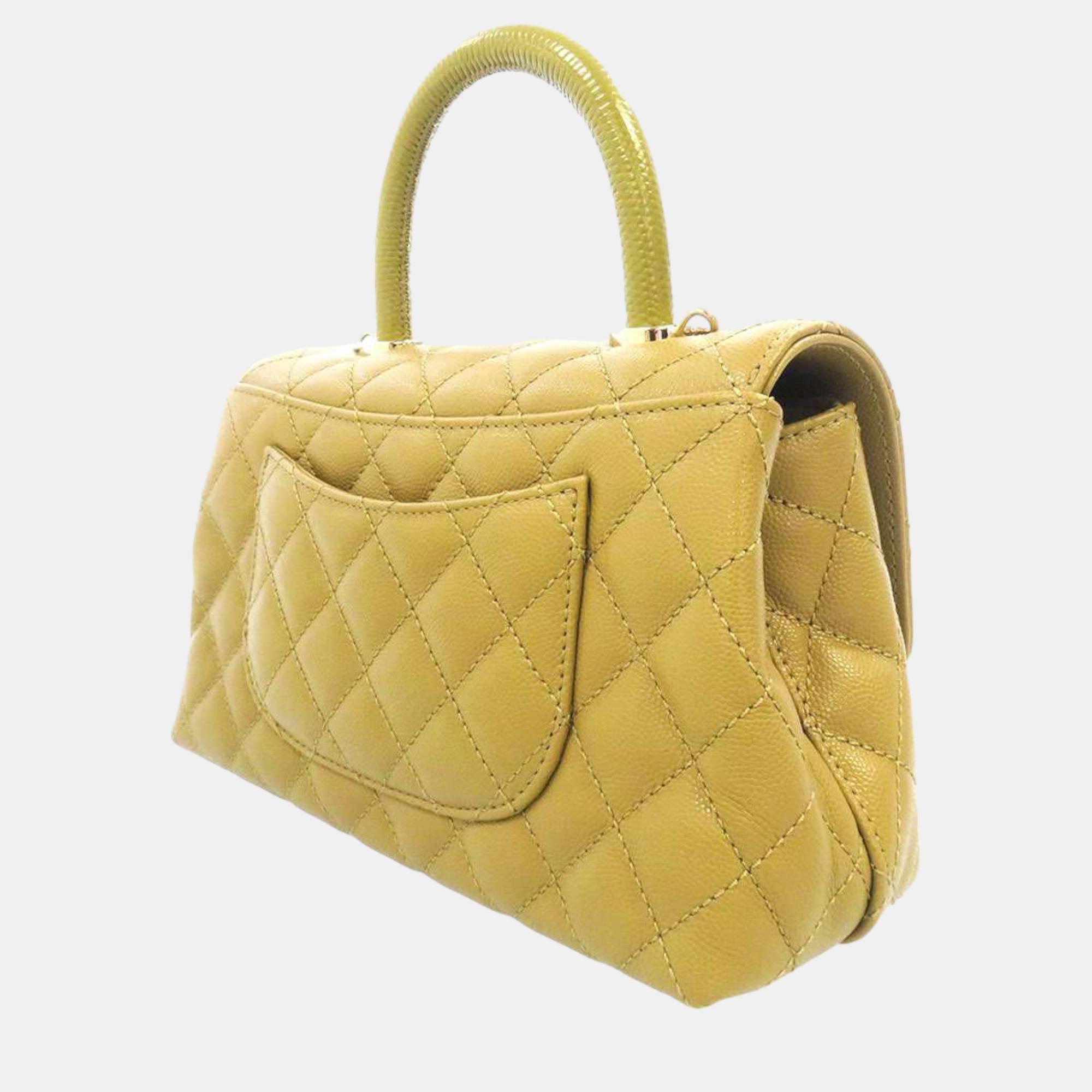 

Chanel yellow Caviar Leather Coco Top Handle Bag