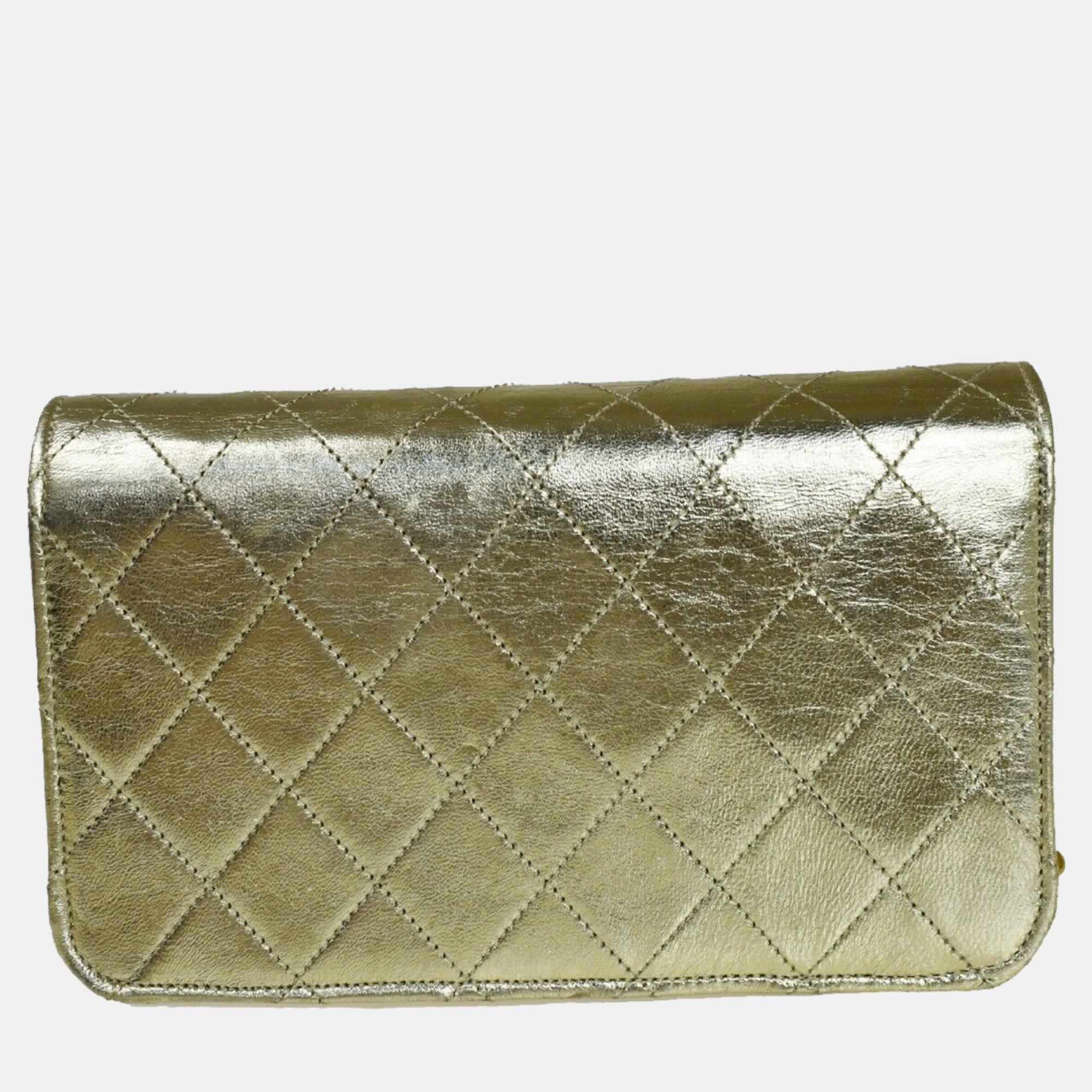 

Chanel Gold Leather Mini flap handbag