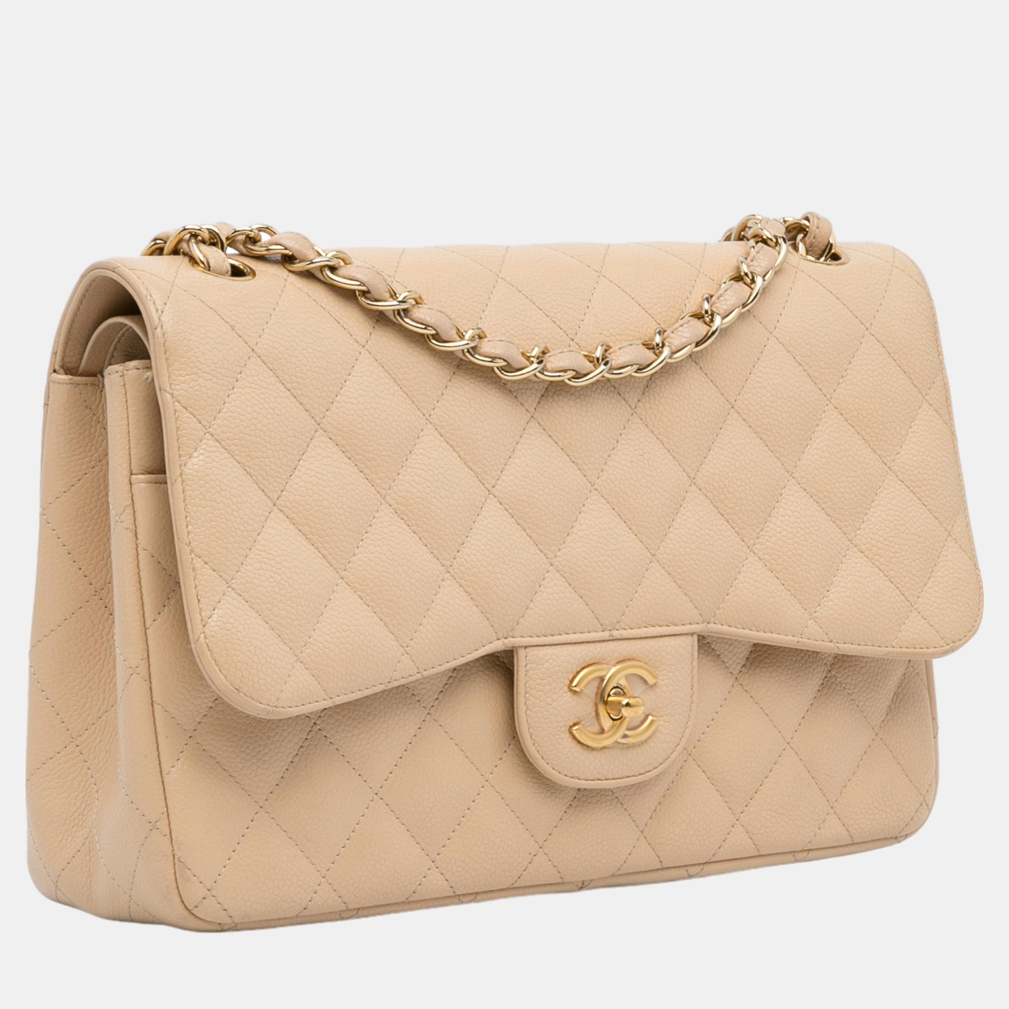 

Chanel Beige Jumbo Classic Caviar Double Flap