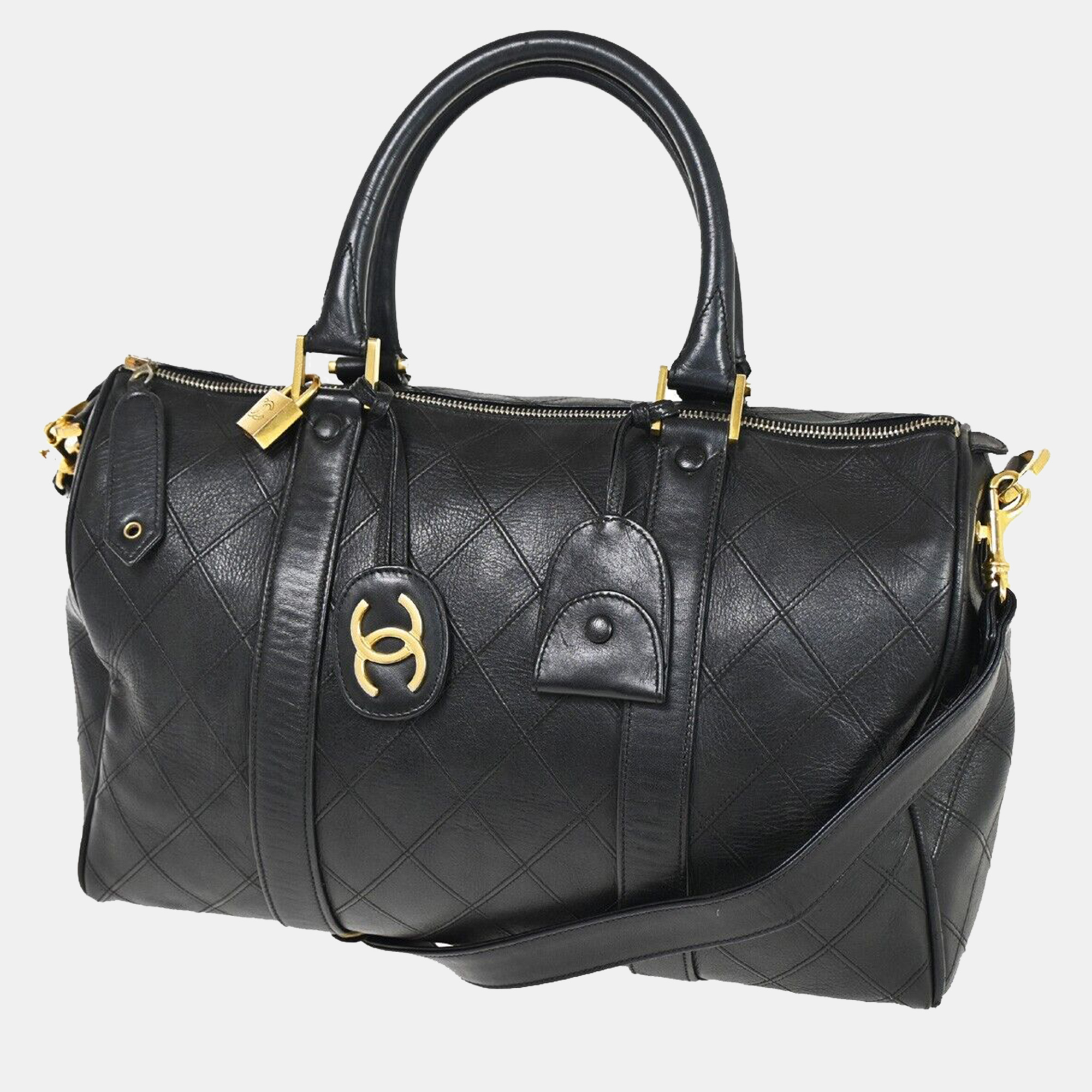 

Chanel Black Leather Boston travel Bag