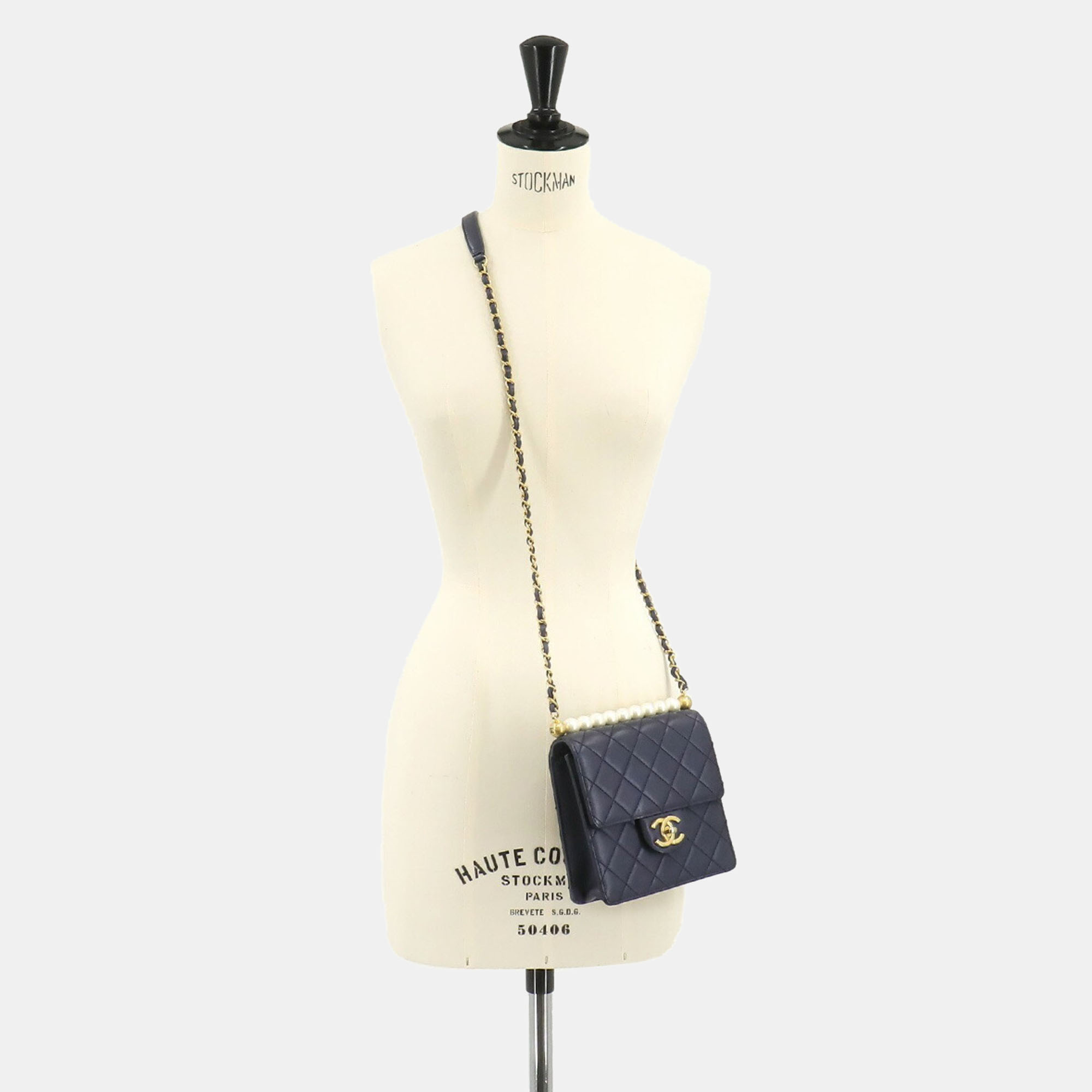 

Chanel Navy Blue Mini Chic Pearls Crossbody
