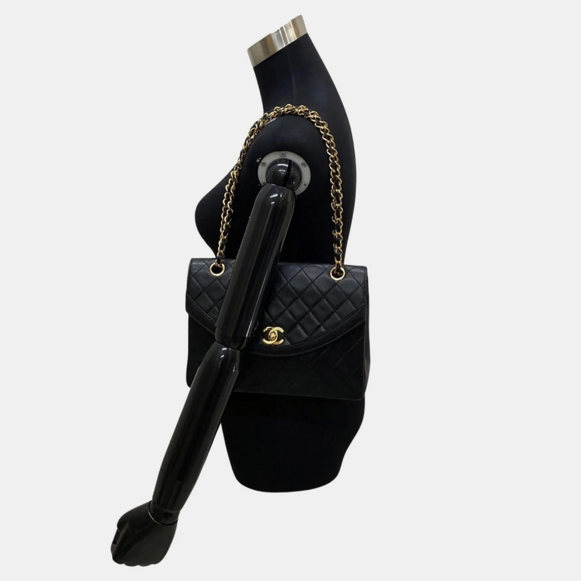 

CHANEL Quilted CC Flap Shoulder Bag, Black
