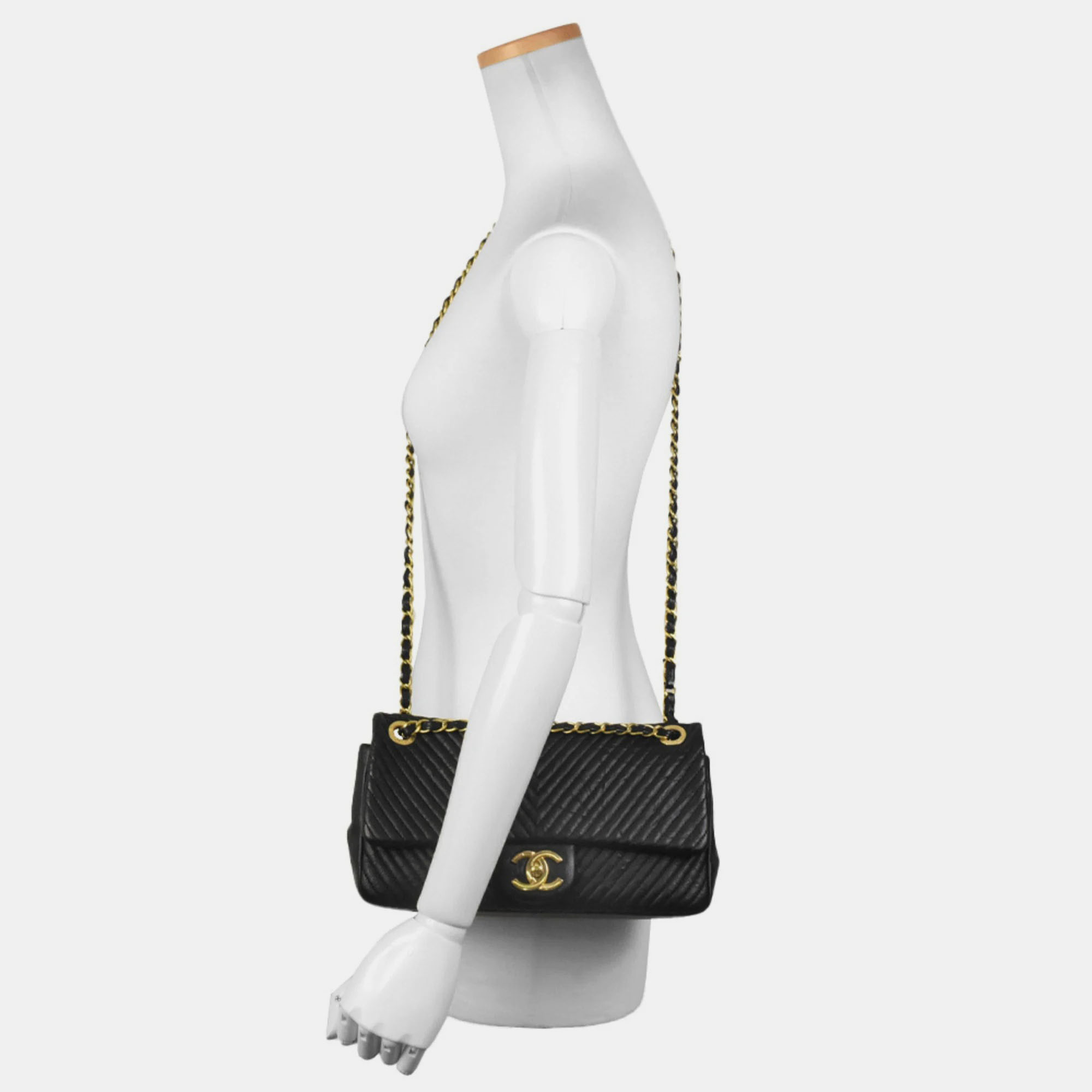 

Chanel Black Chevron Leather Medium Flap Bag