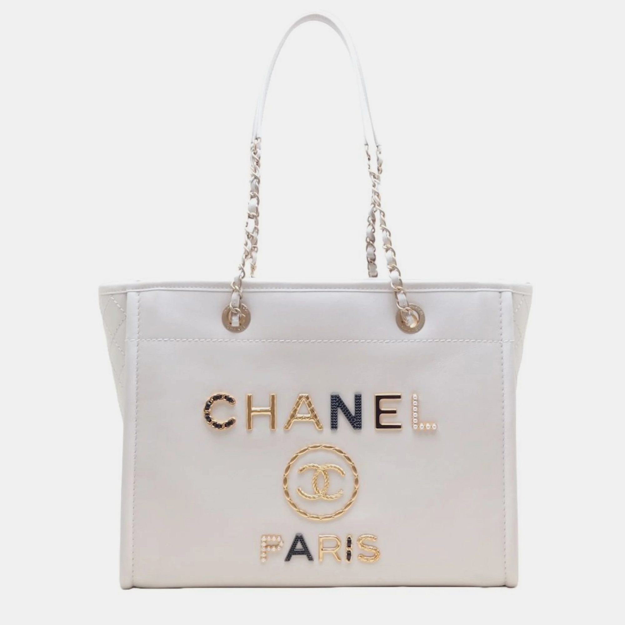 

CHANEL Embellished Canvas Medium Studded Deauville Shopping Bag, Beige