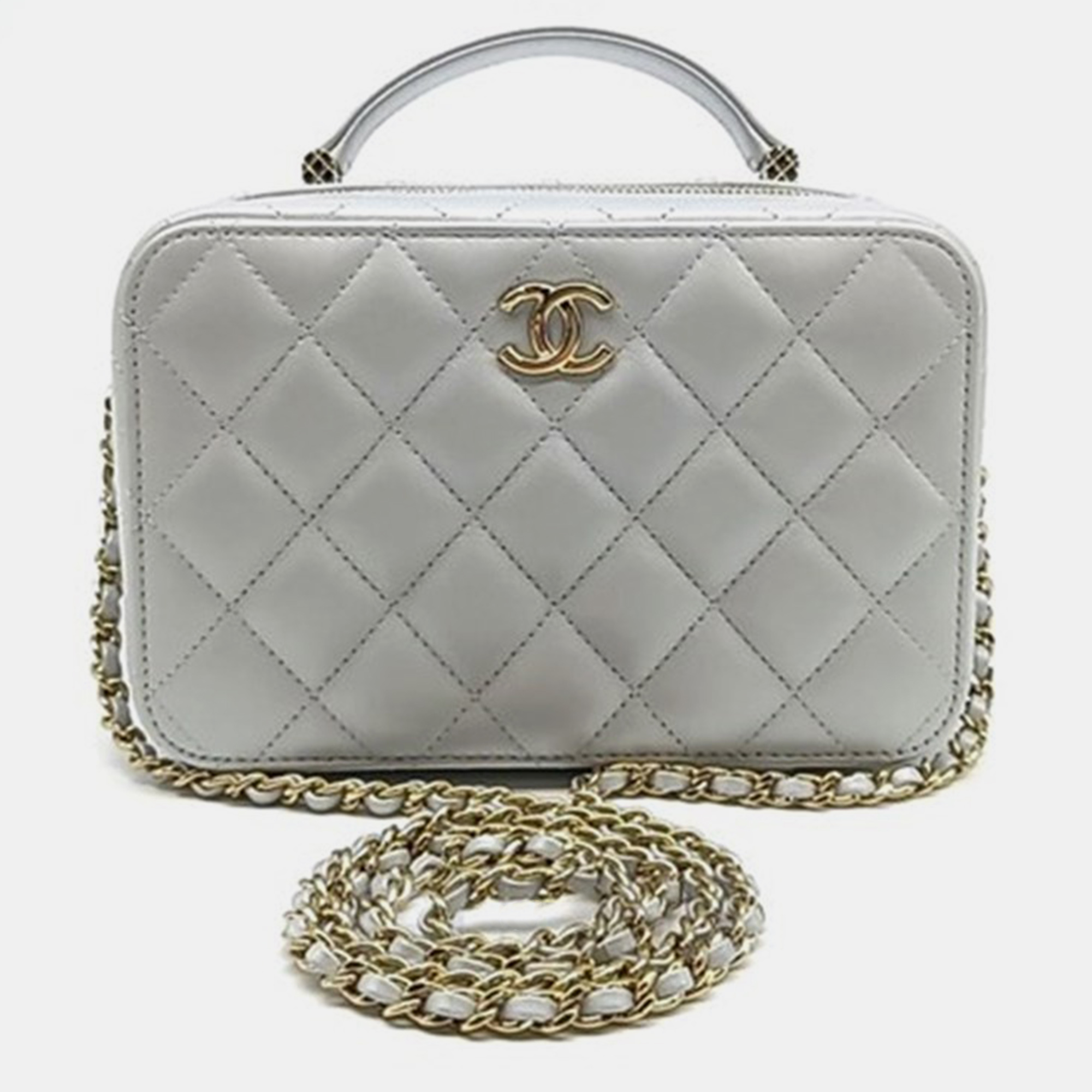 

Chanel Metallic Grey and Champagne Gold Lambskin Leather Vanity Case Bag