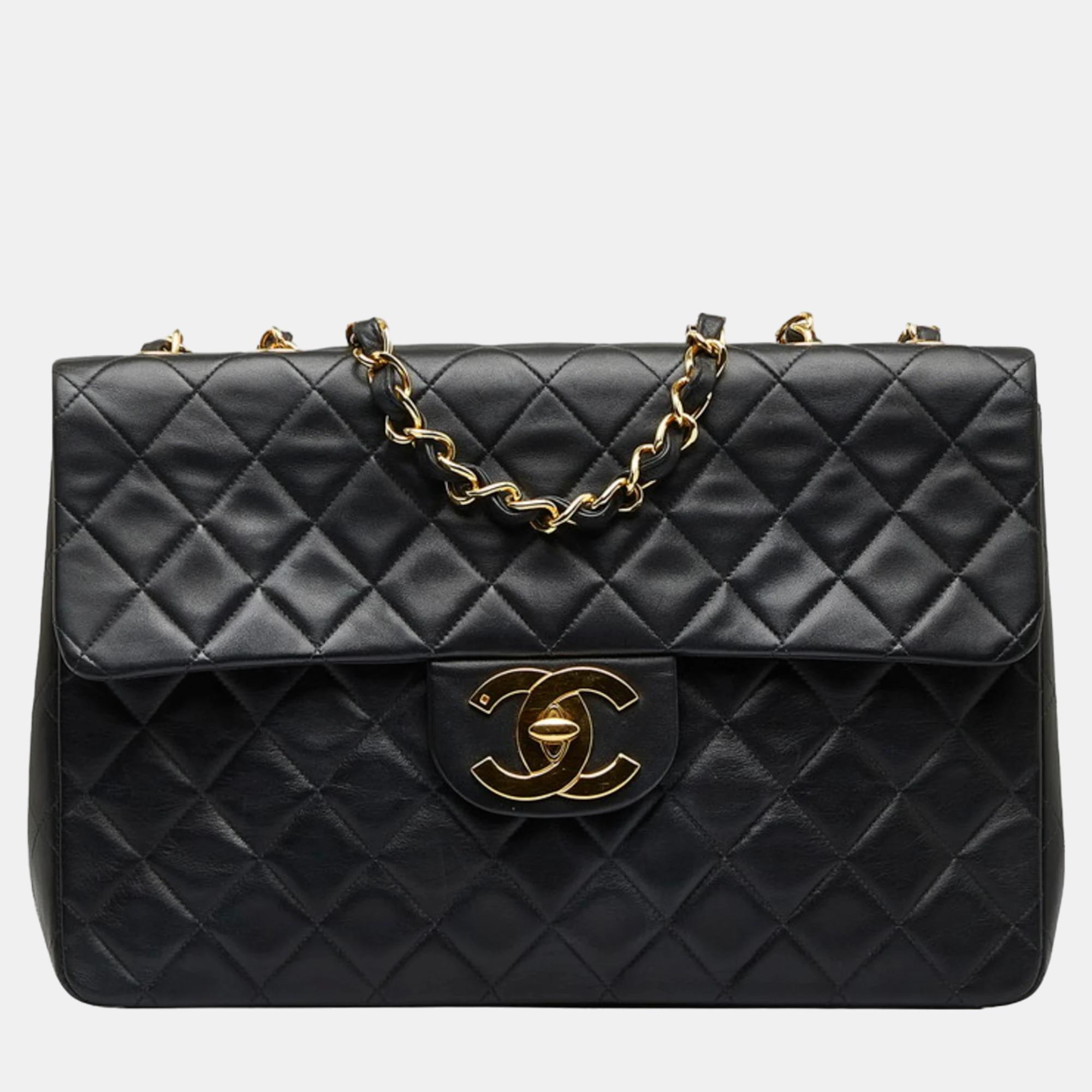 

Chanel Black Lambskin Leather Maxi Jumbo  Flap Bag