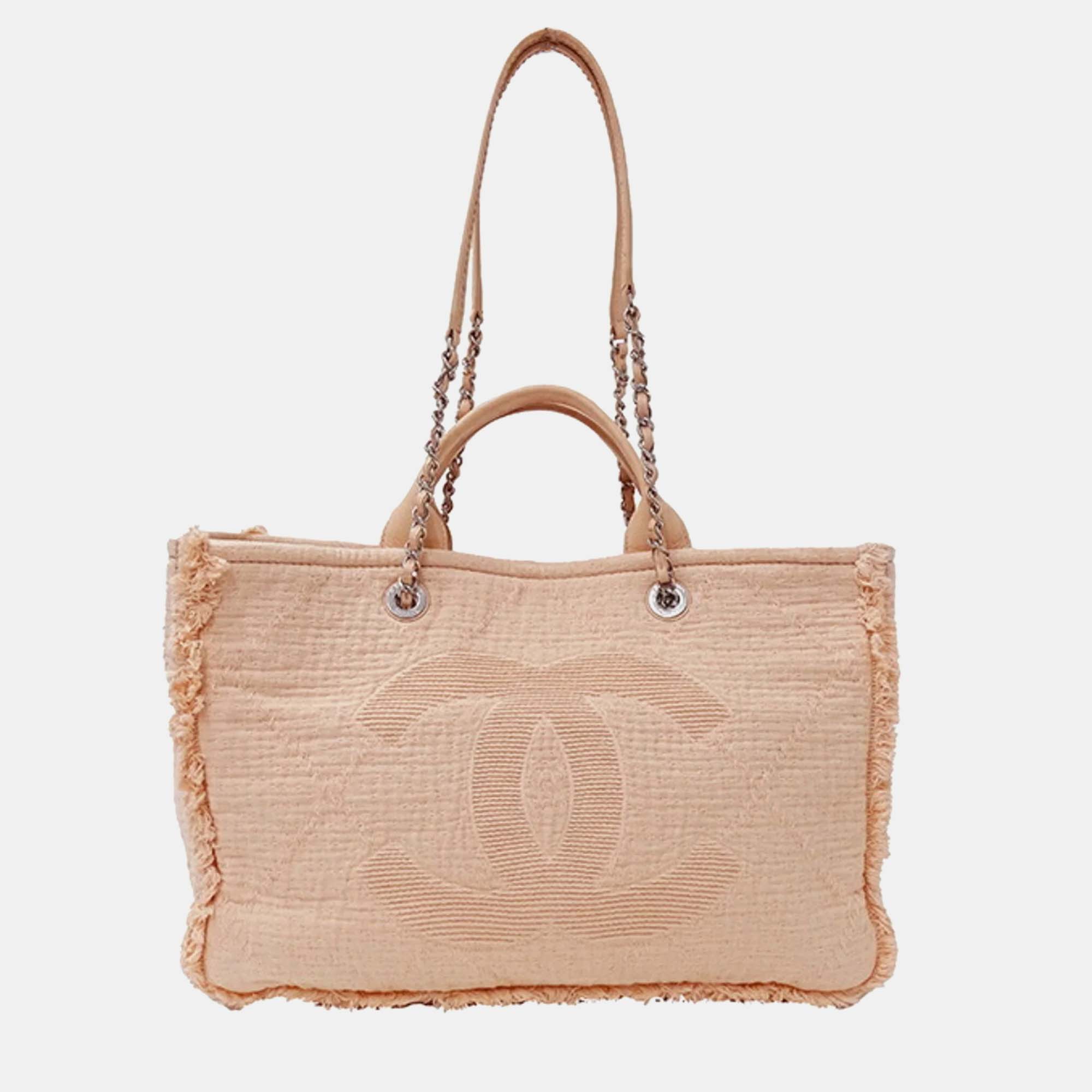 

Chanel Pink Canvas Large Deauville Satchels