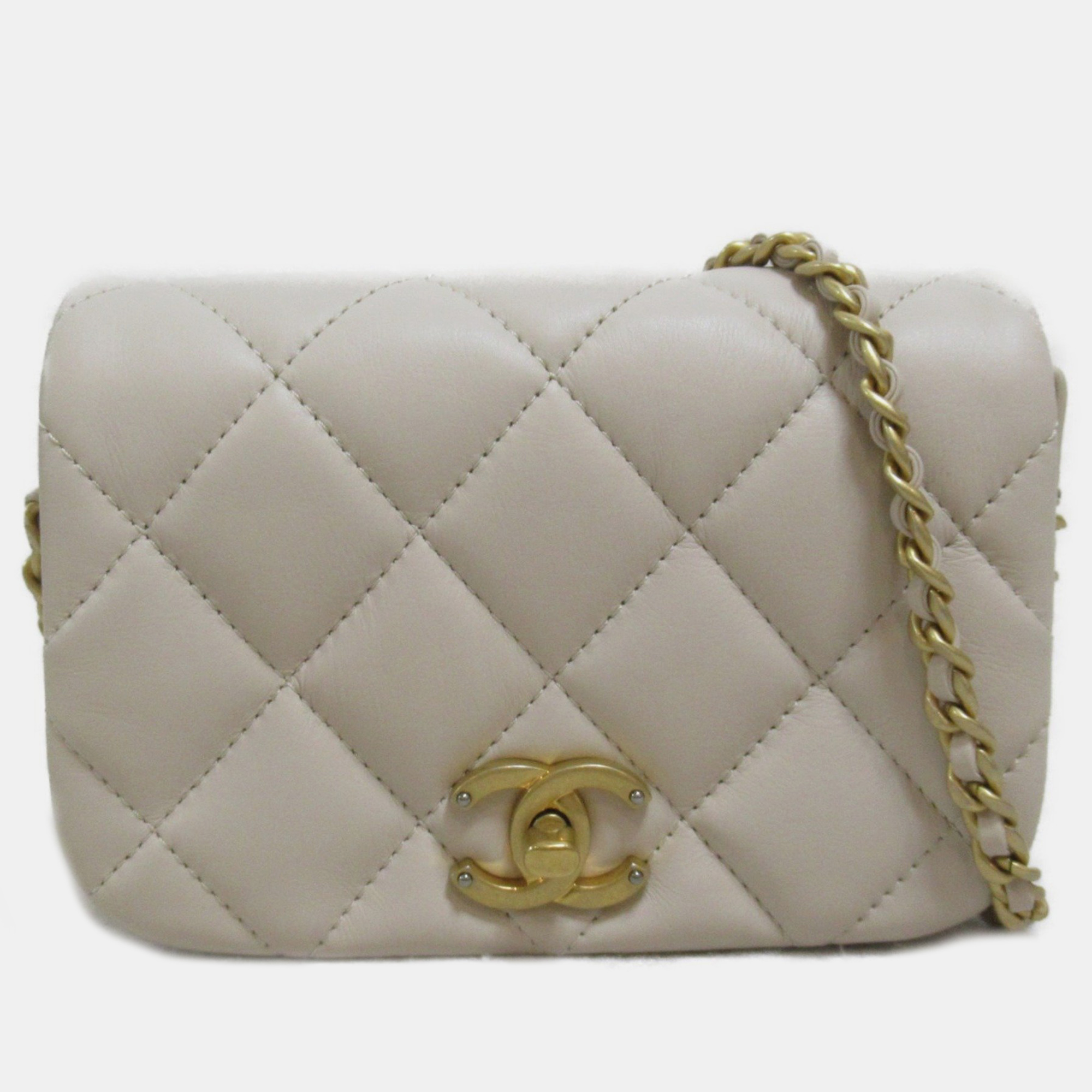 

Chanel Quilted Calfskin Mini Nailed CC Full Flap Bag, Beige