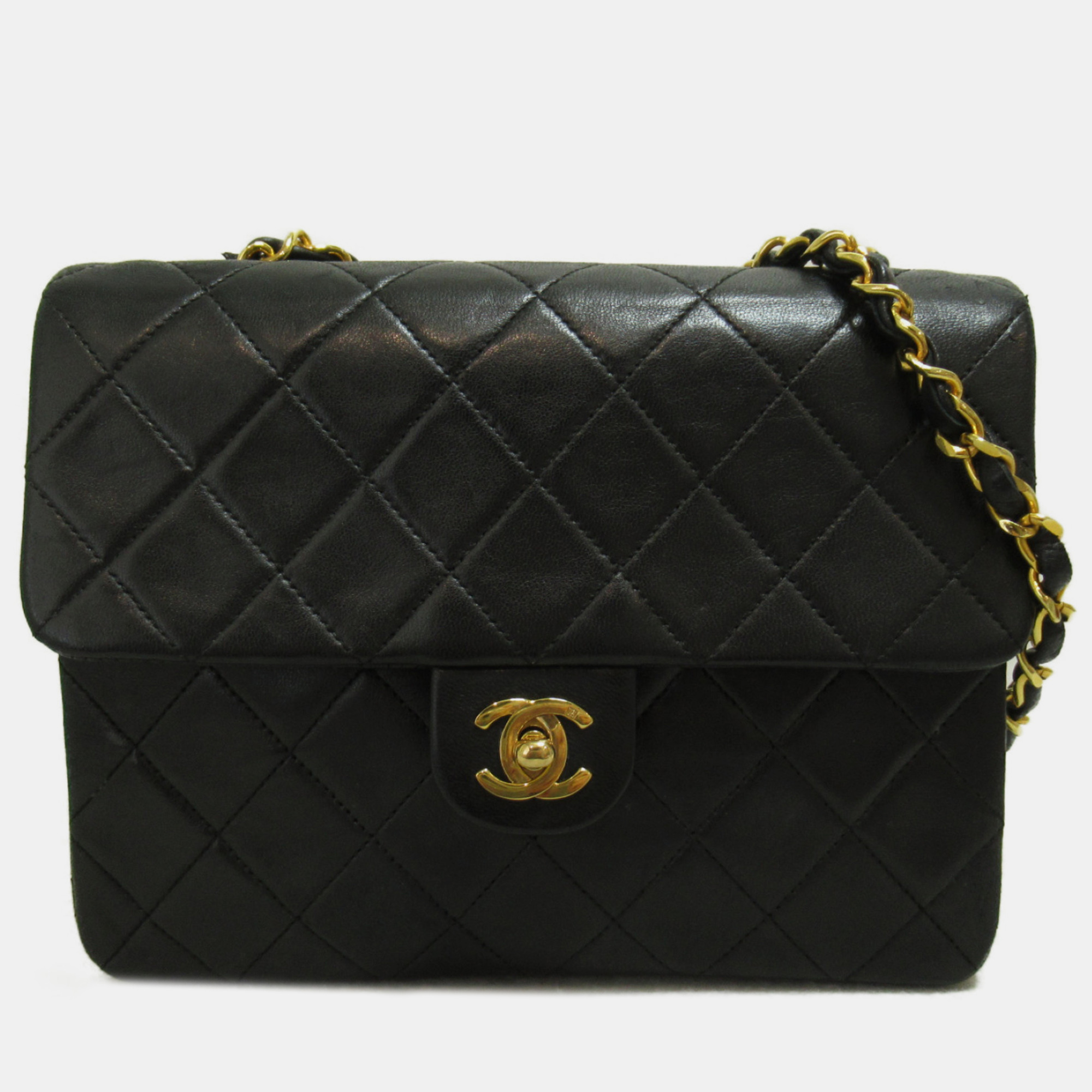 

Chanel black quilted lambskin Timeless Mini shoulder flap bag