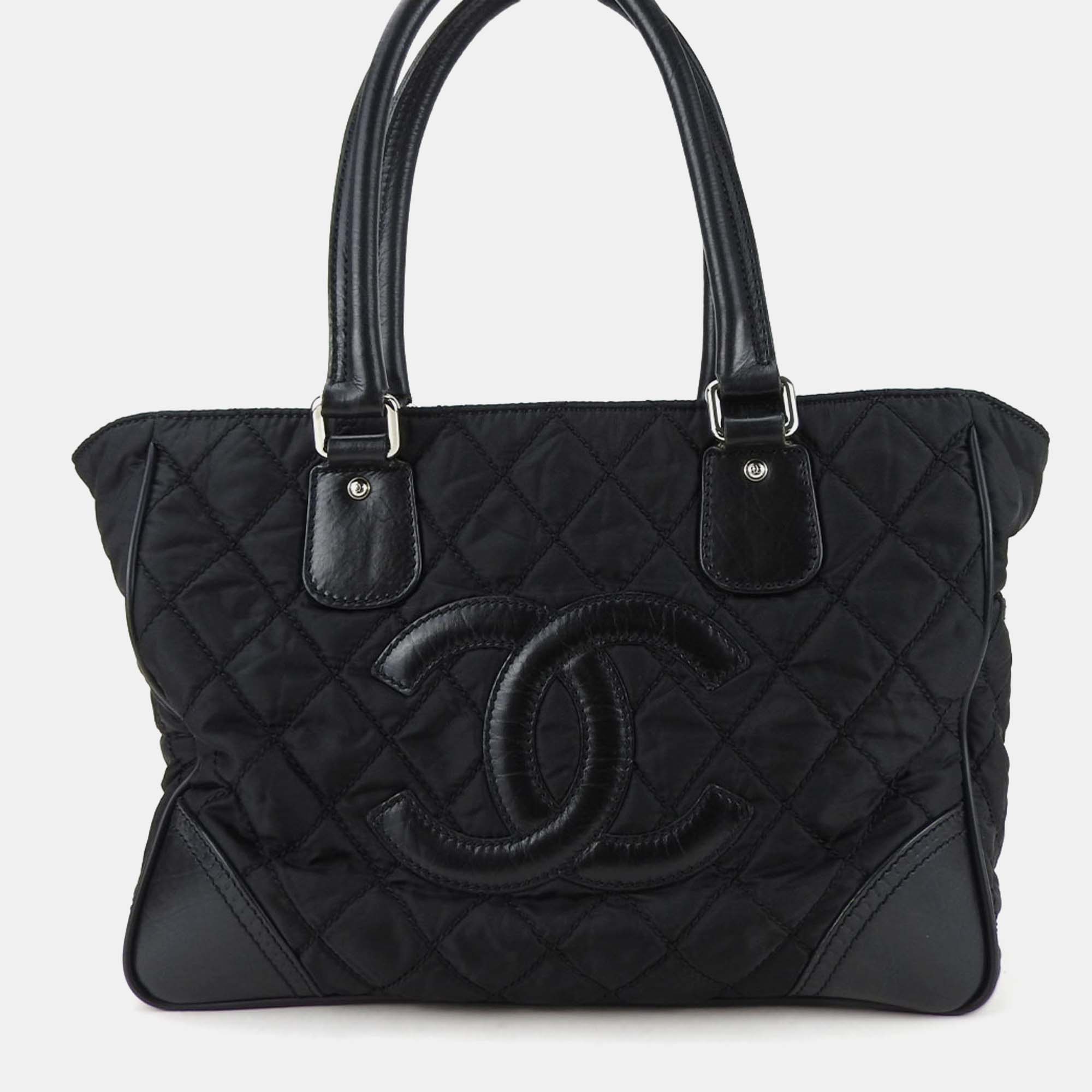 

Chanel Black Nylon/Leather Paris New York Timeless Tote Bag