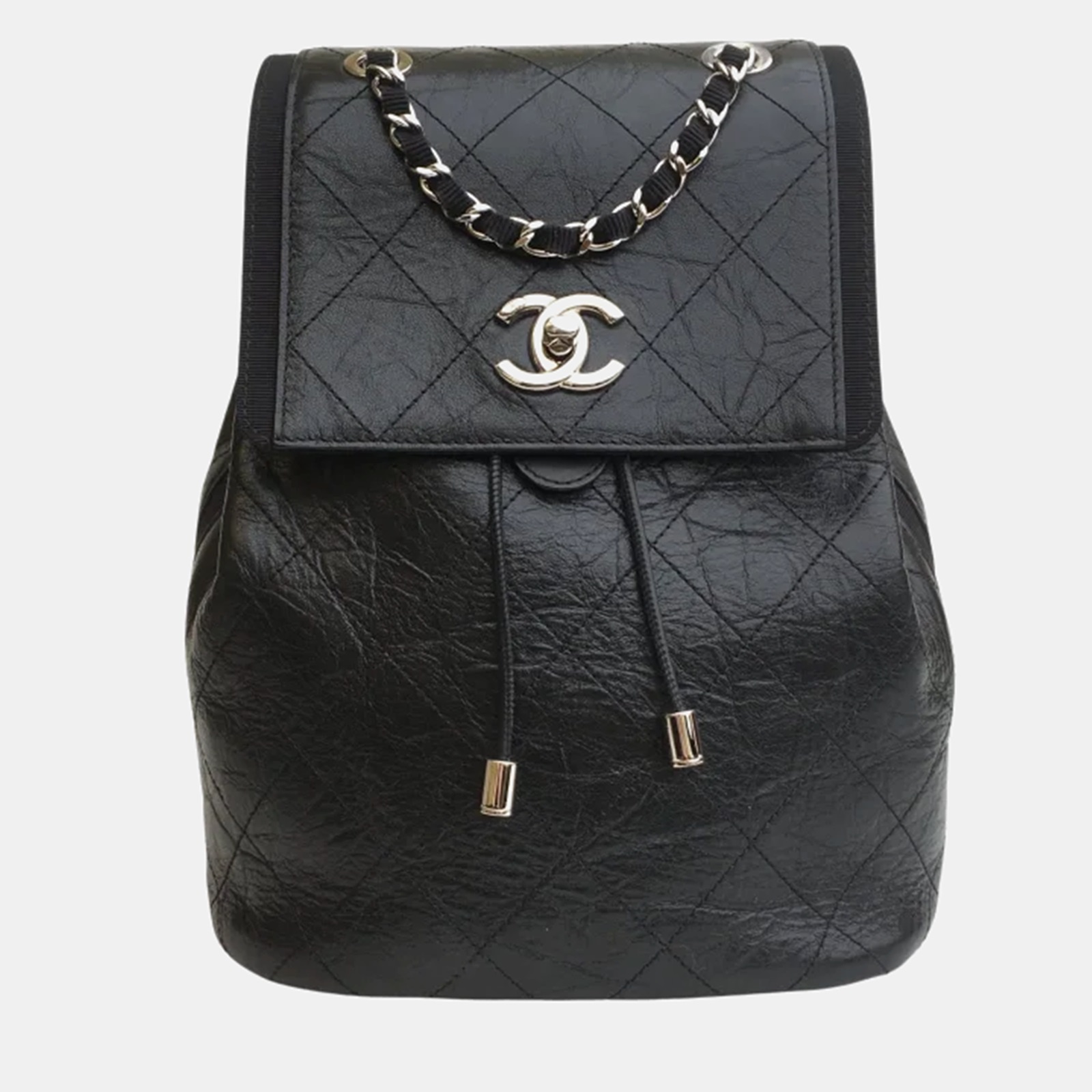 

Chanel Black Quilted Aged Calfskin and Grosgrain Small Drawstring CC Flap Backpack