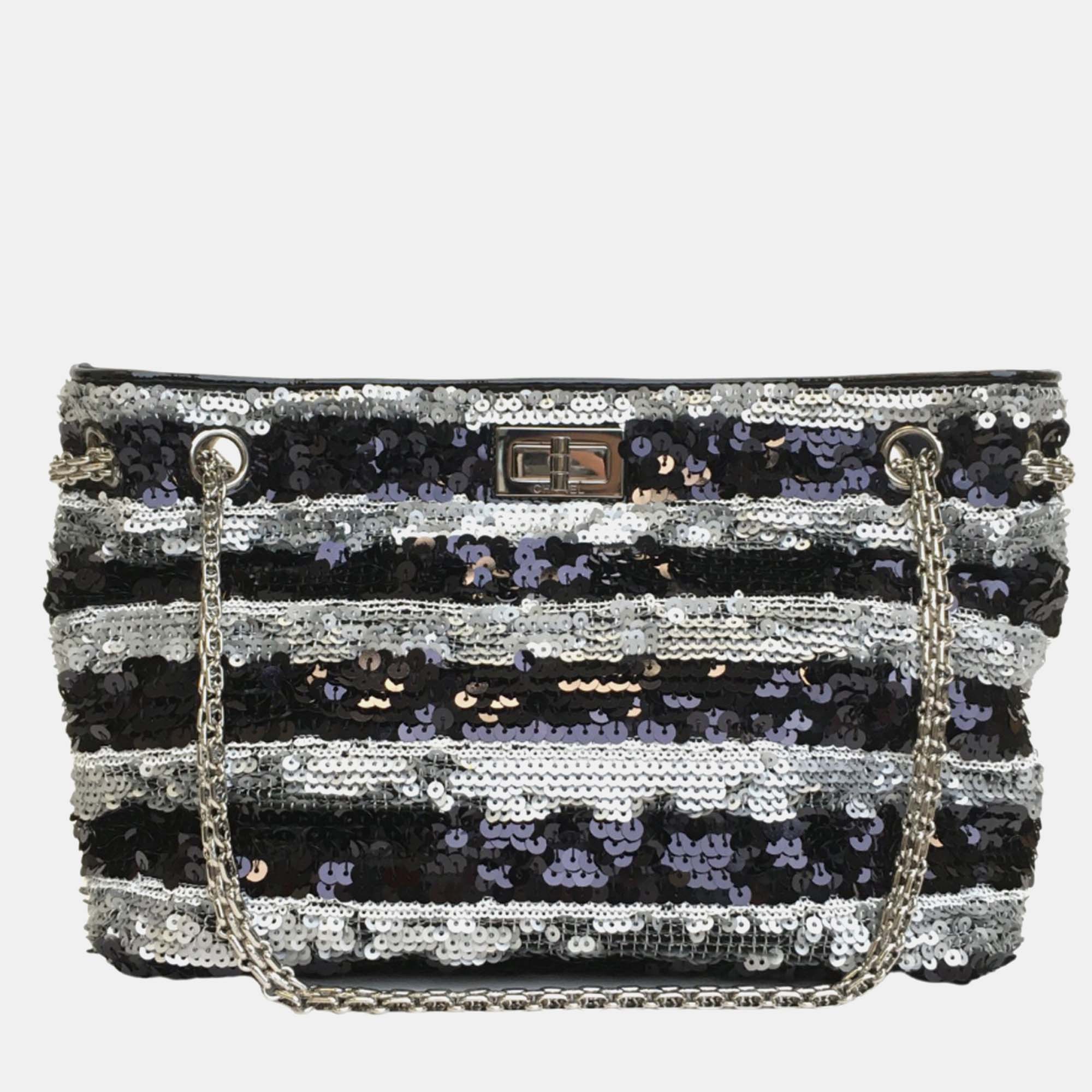 Crafted with exquisite precision this timeless Chanel clutch combines luxury with practicality ensuring you make a chic statement at every soirée.
