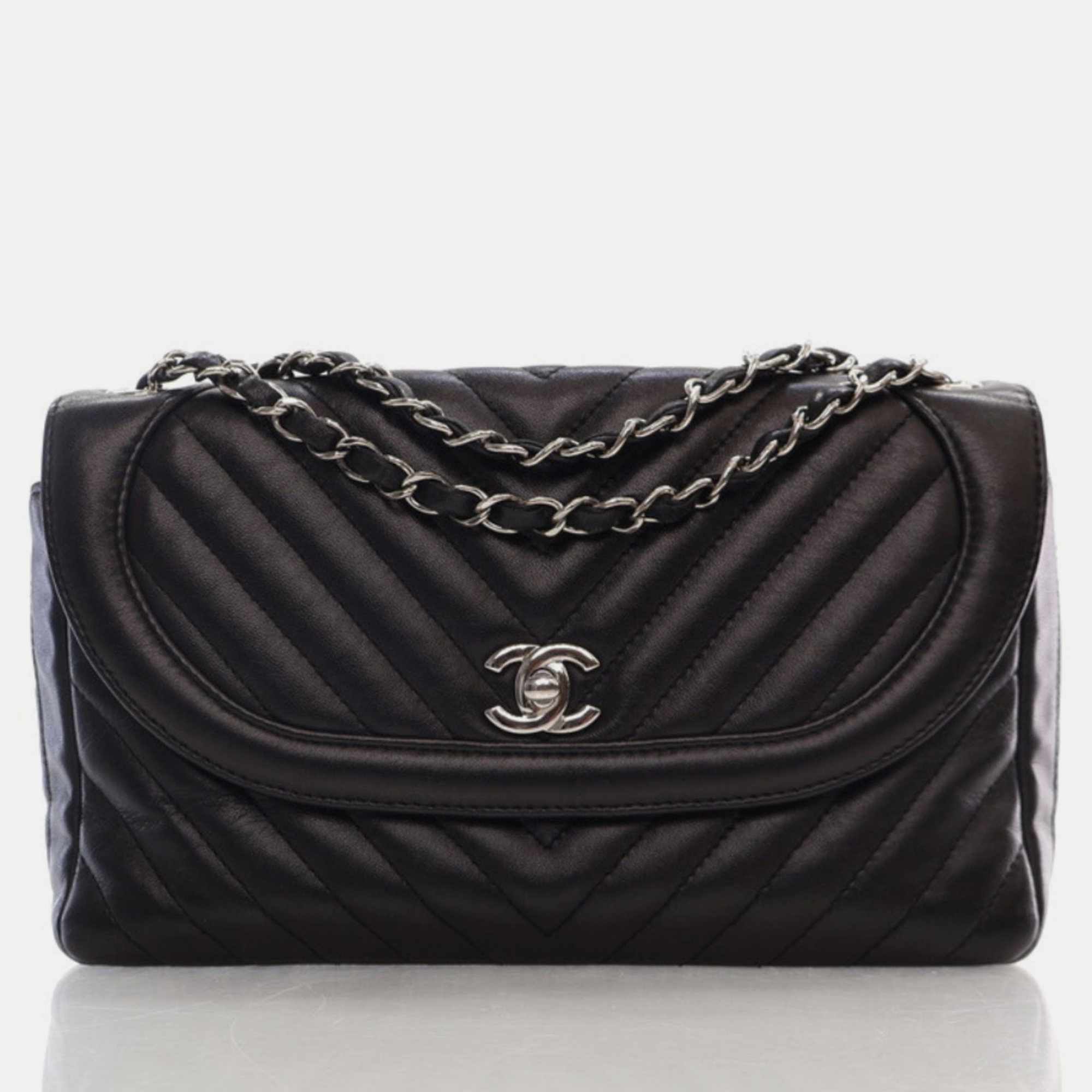 

Chanel Black Chevron Lambskin Medium Round CC Chain Flap Bag