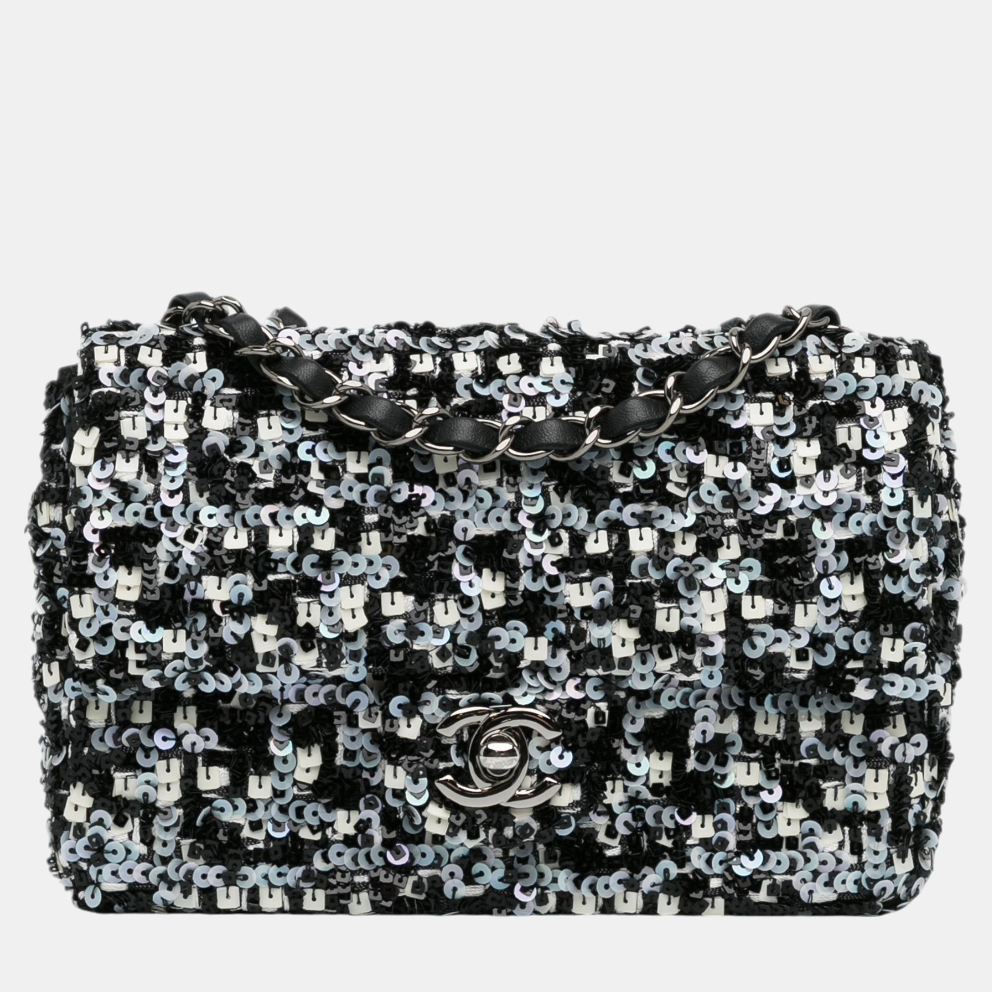 

Chanel Black Mini Lambskin Sequin Single Flap