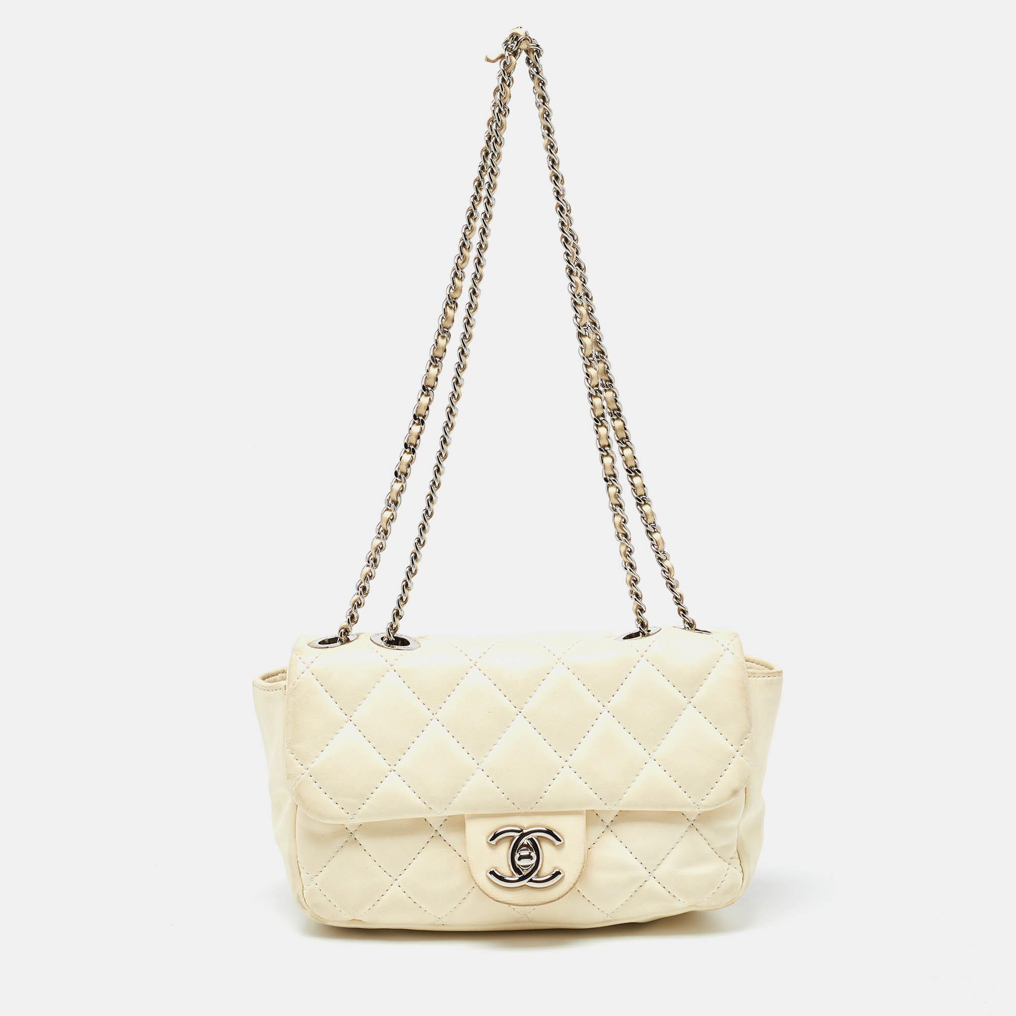 

Chanel White Quilted Leather Mini Coco Rain Flap Bag