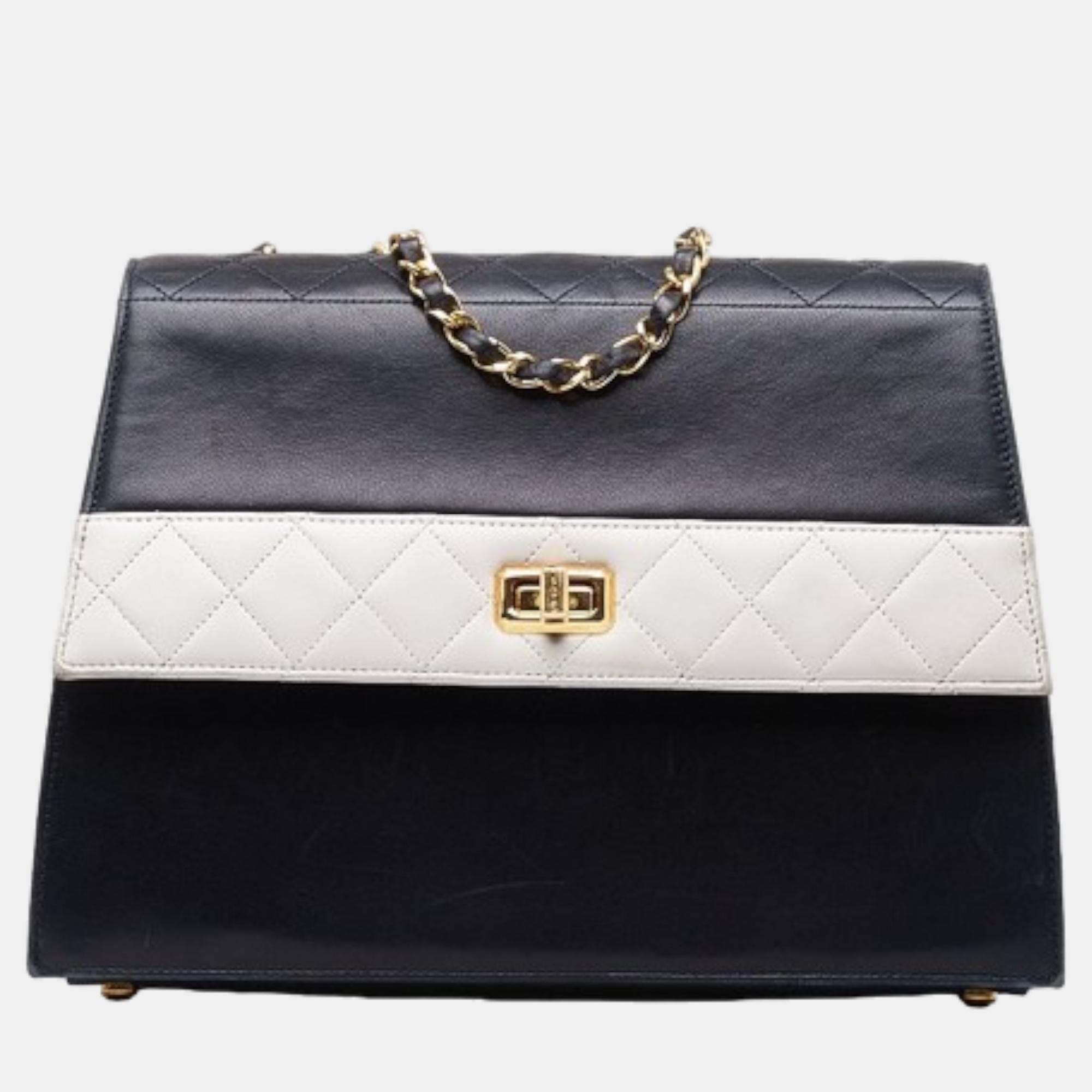 

Chanel Black/White CC Lambskin Trapezoid Flap Bag