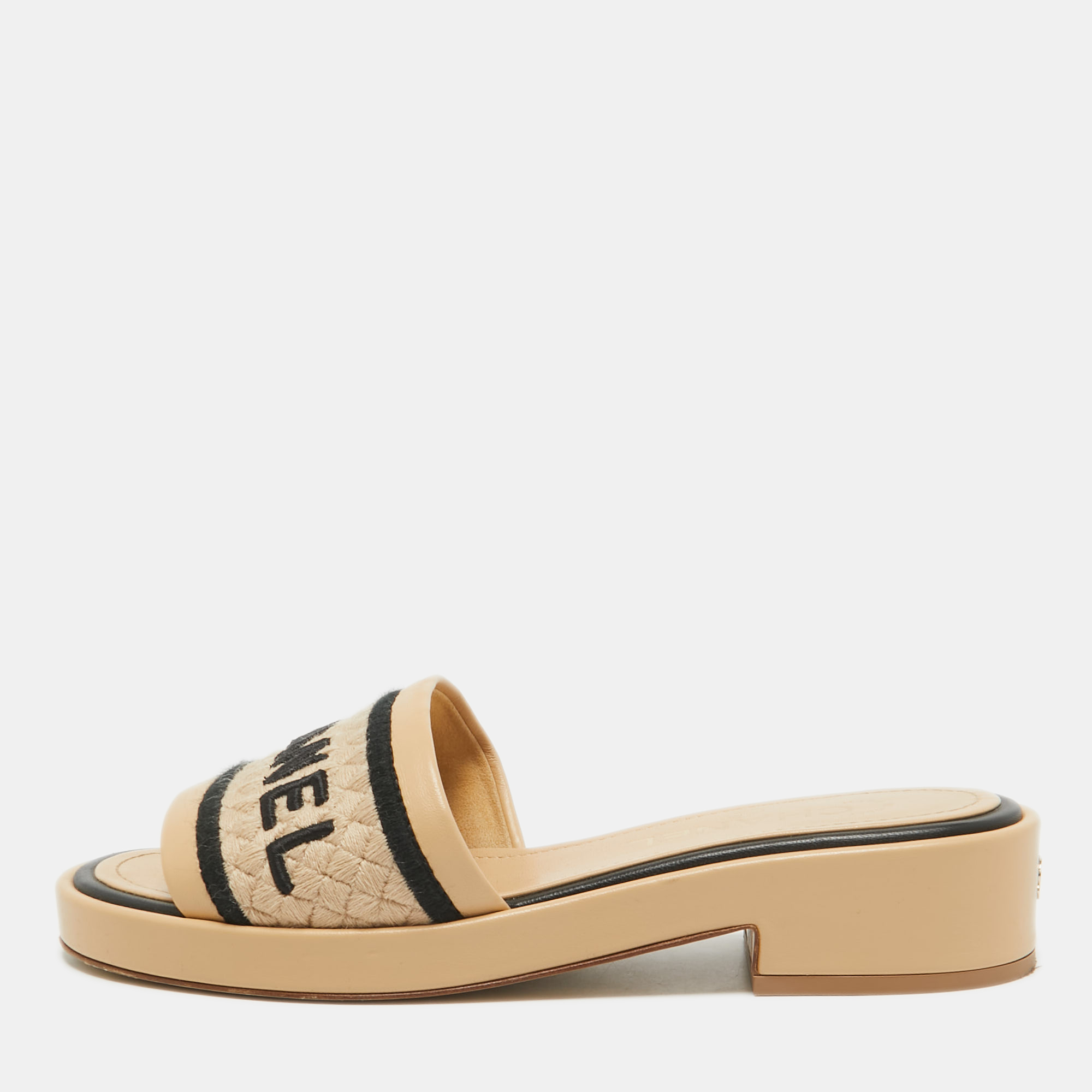 

Chanel Beige Canvas and Leather CC Flat Slides Size