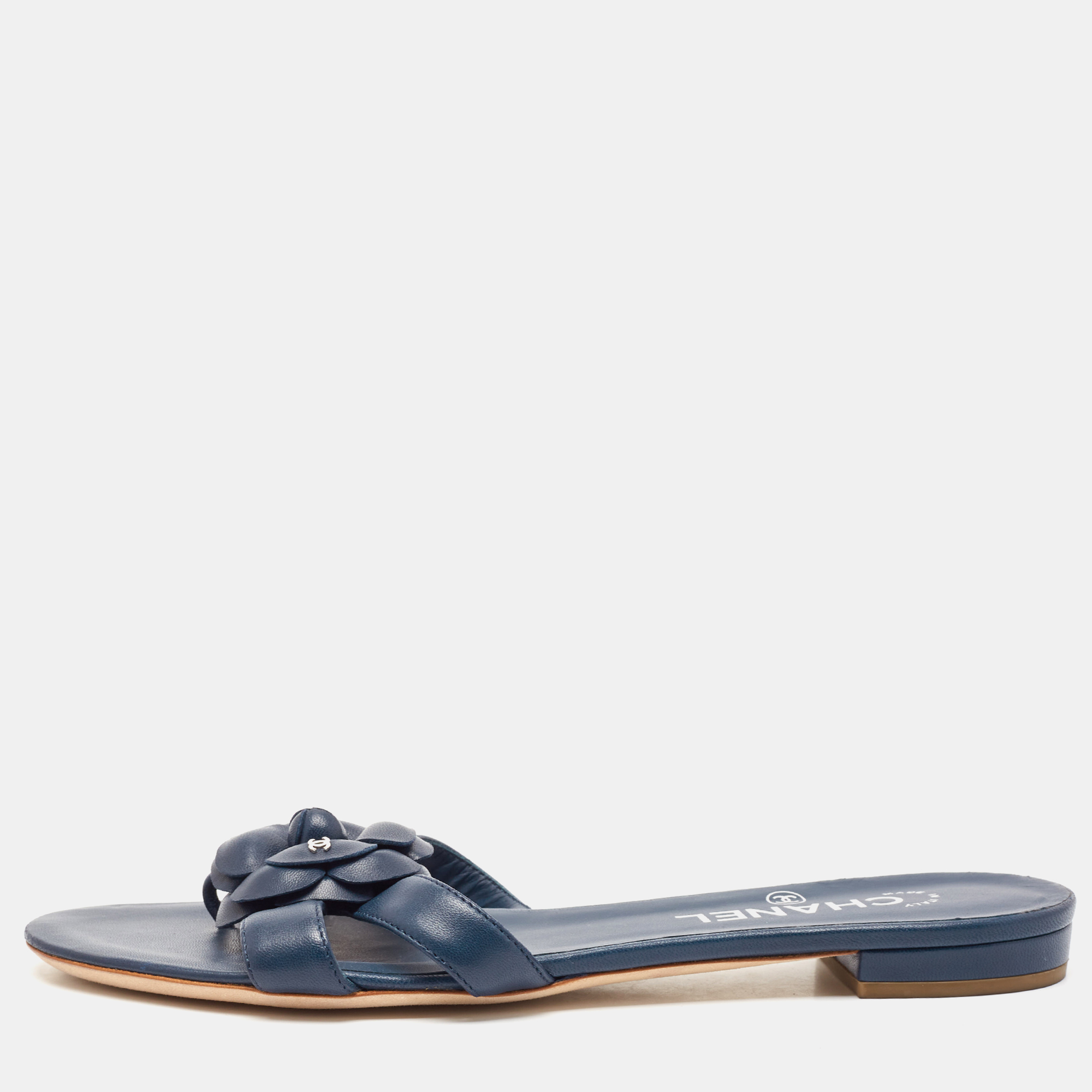 

Chanel Navy Blue Leather CC Camellia Flat Sandals Size