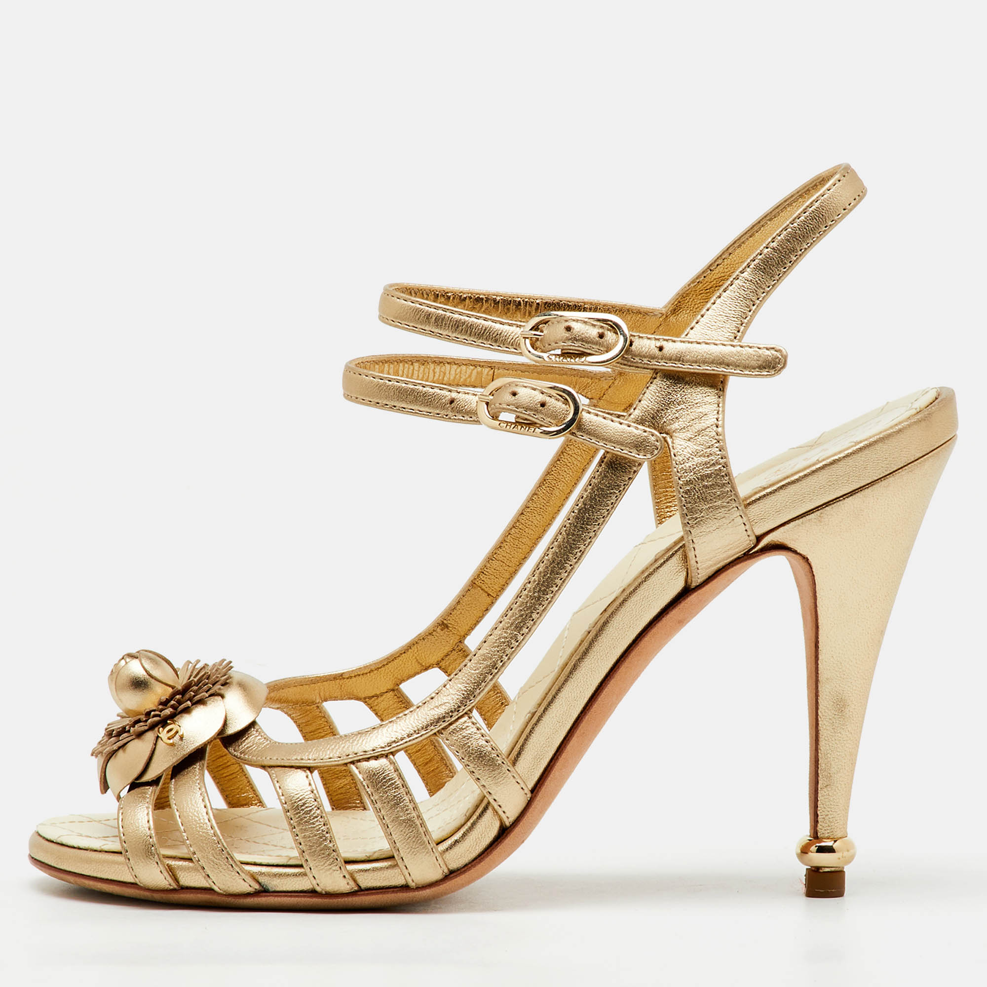 

Chanel Metallic Gold Leather CC Camellia Ankle Strap Sandals Size
