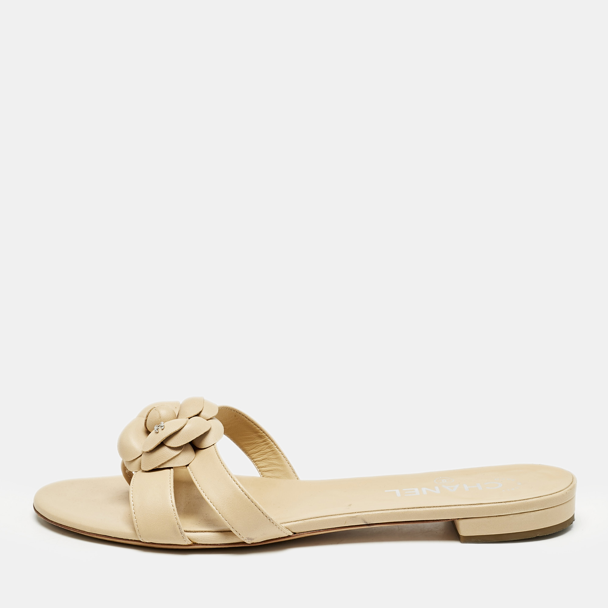 

Chanel Beige Leather Camellia Flat Slides Size